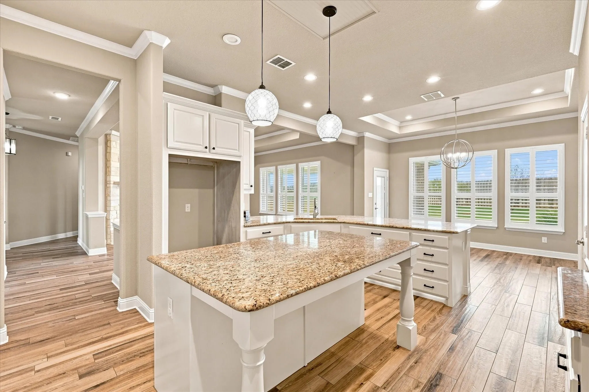 Beautiful pendant lights above the kitchen island.