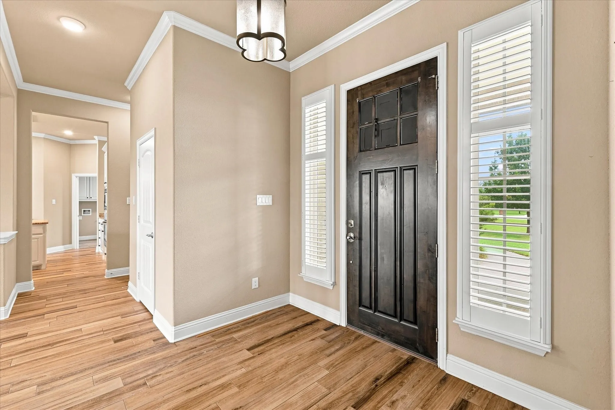 Welcoming entryway with space for a table or bench.