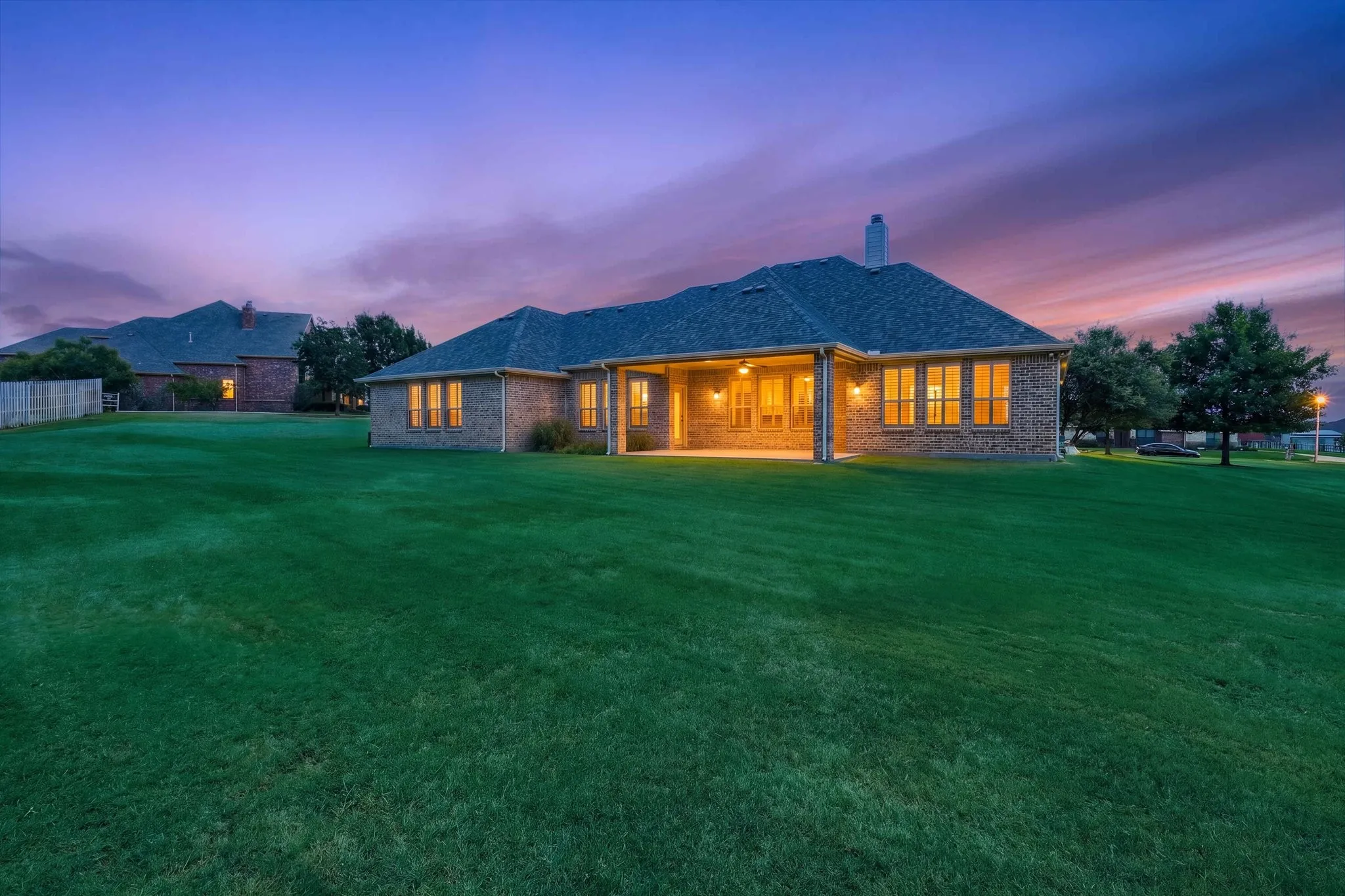 Imagine grilling back here as you watch the sunset and play in the yard.