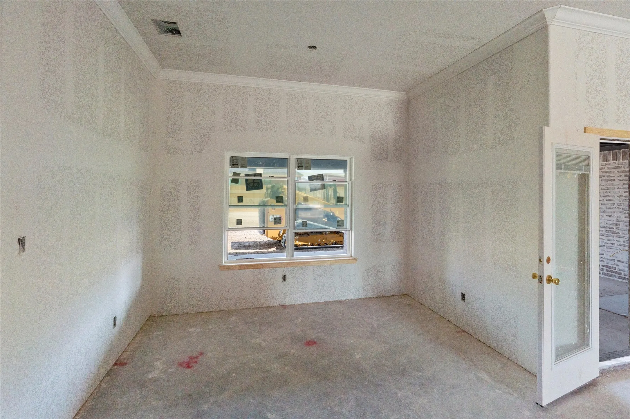 Crown molding, large window, French door, brick exterior detail, drywall finish