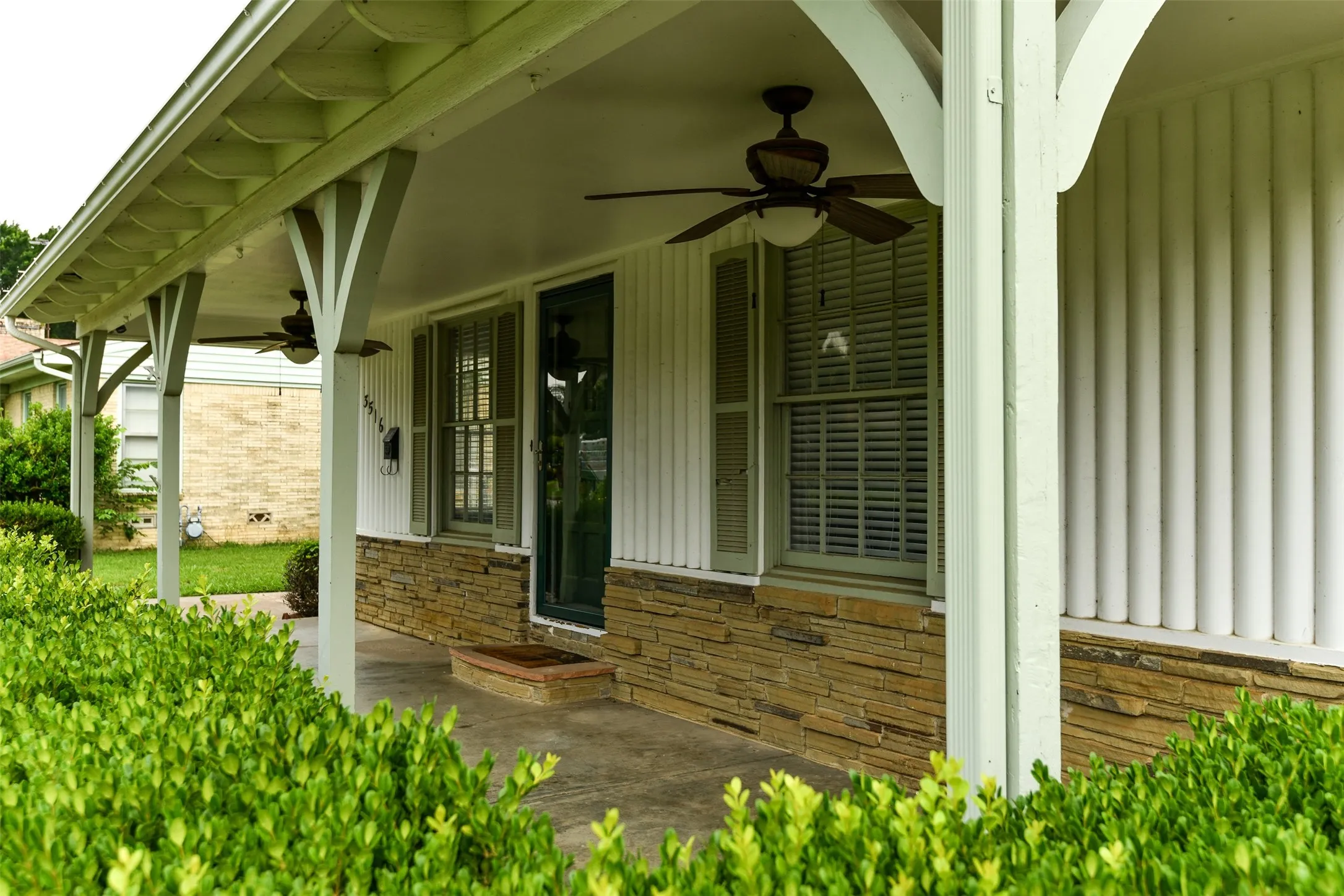View of patio featuring ceiling fan