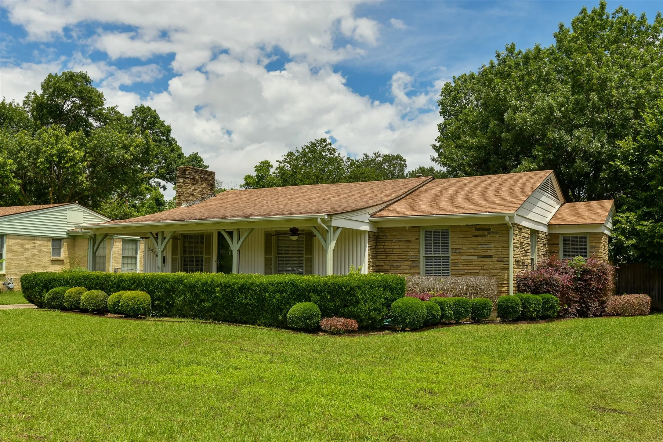 Ranch-style house featuring a front lawn