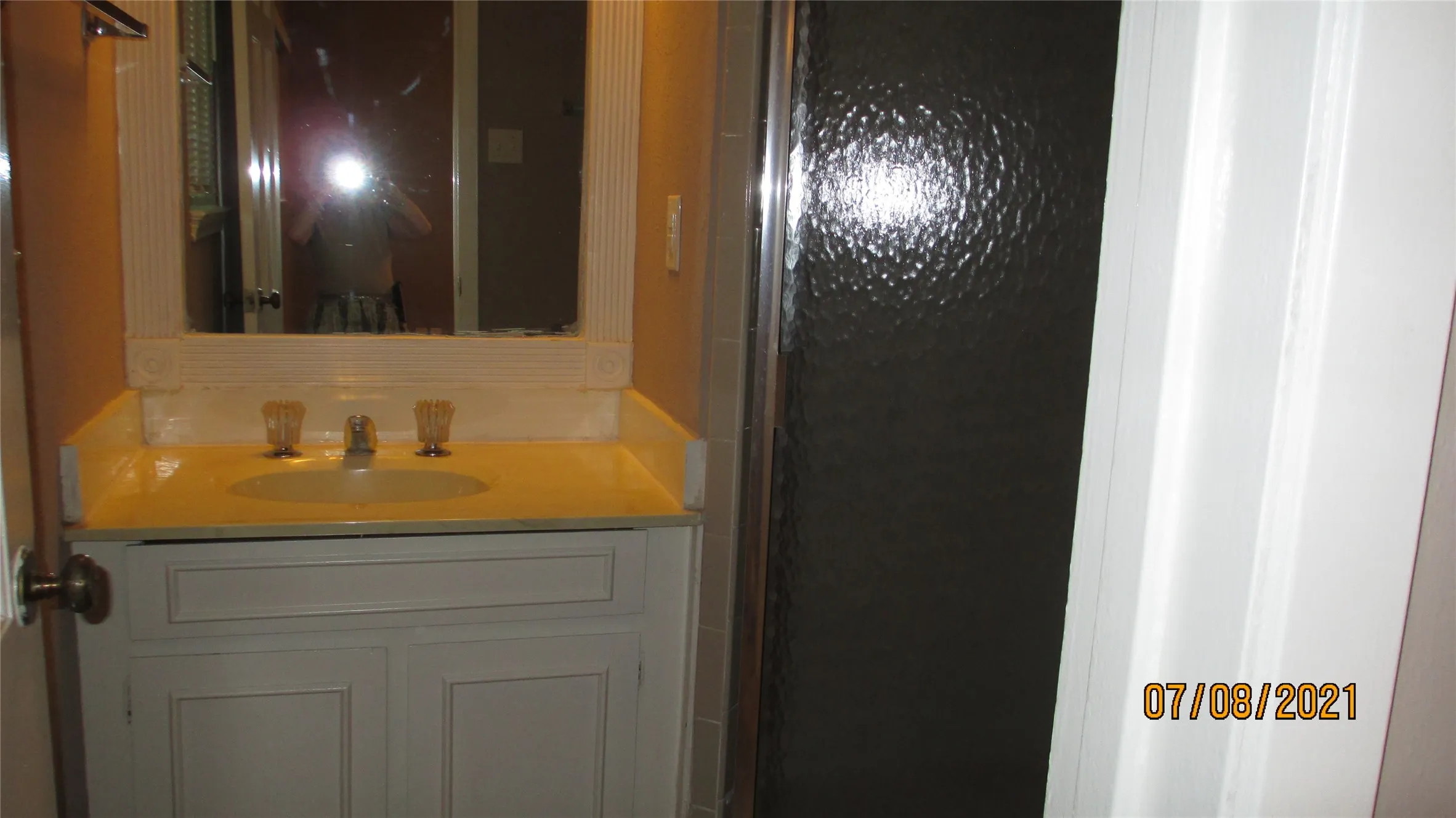 This bath features a shower