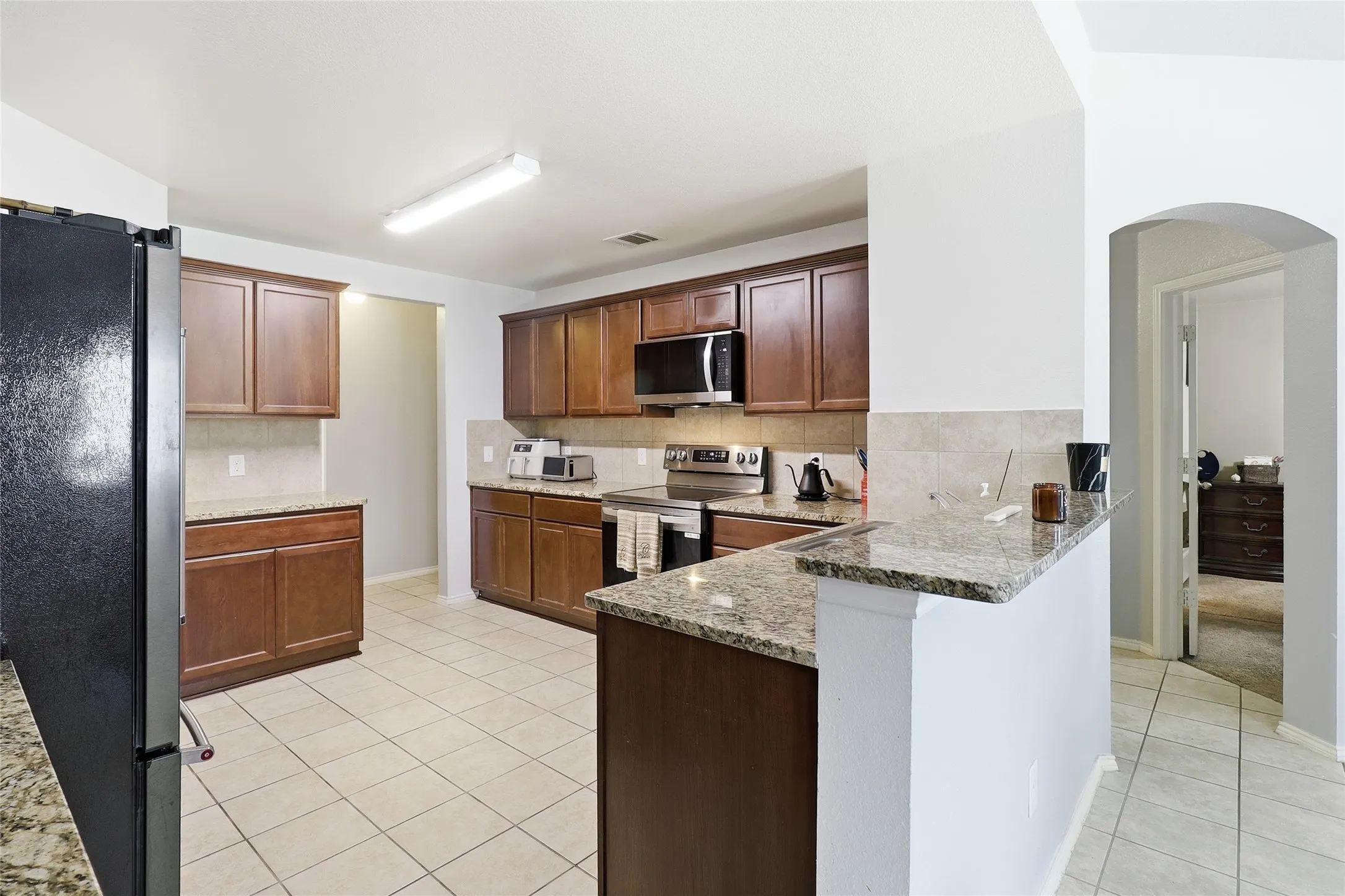 Grantie countertops.  Fridge included!