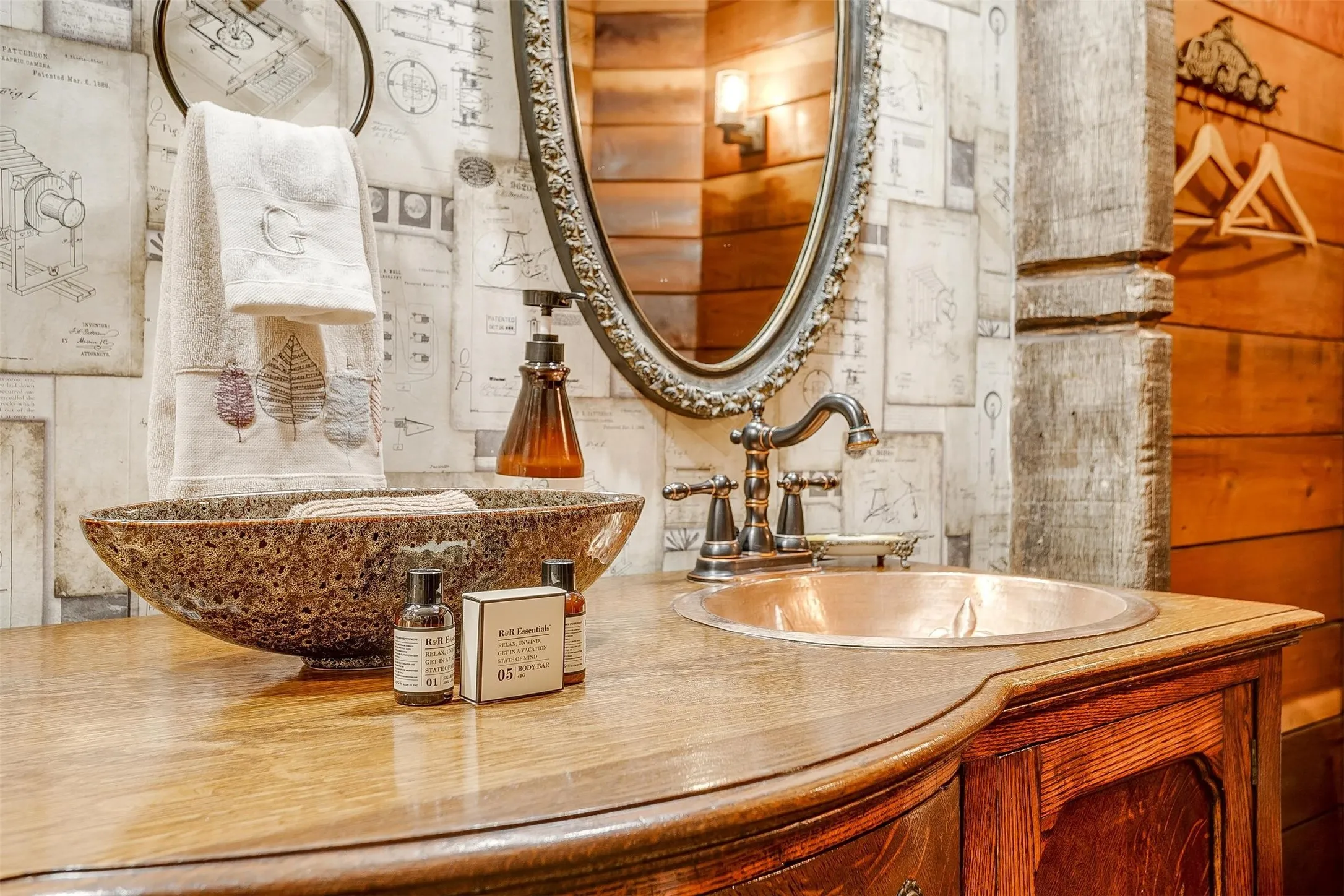 Antique buffet turned double vanity with hand forged cooper sinks