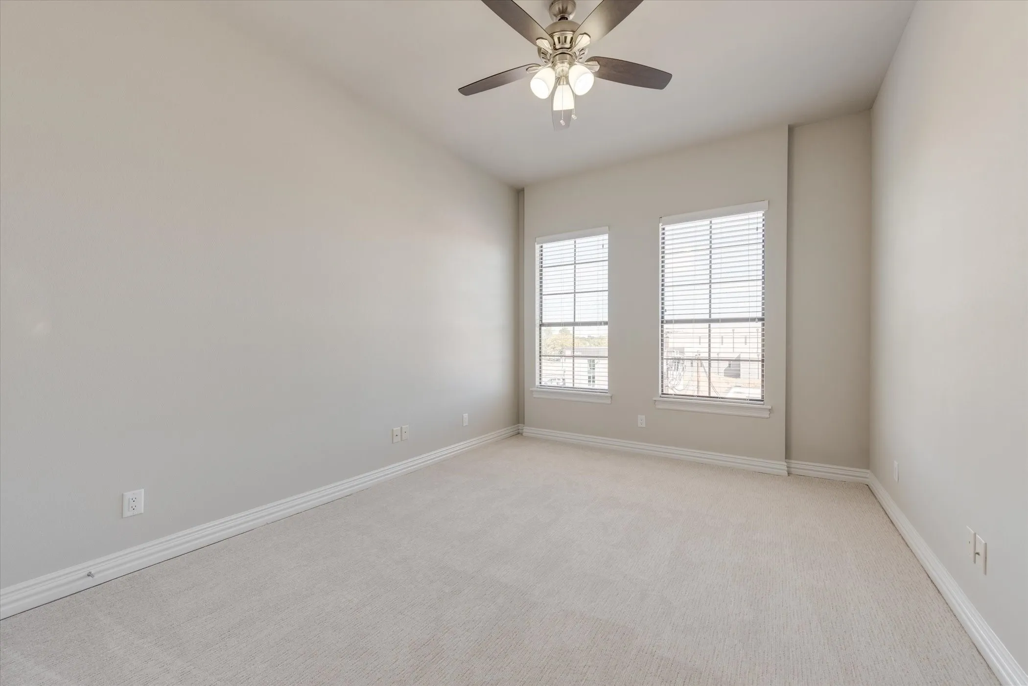 Neutral-toned carpeting with white trim