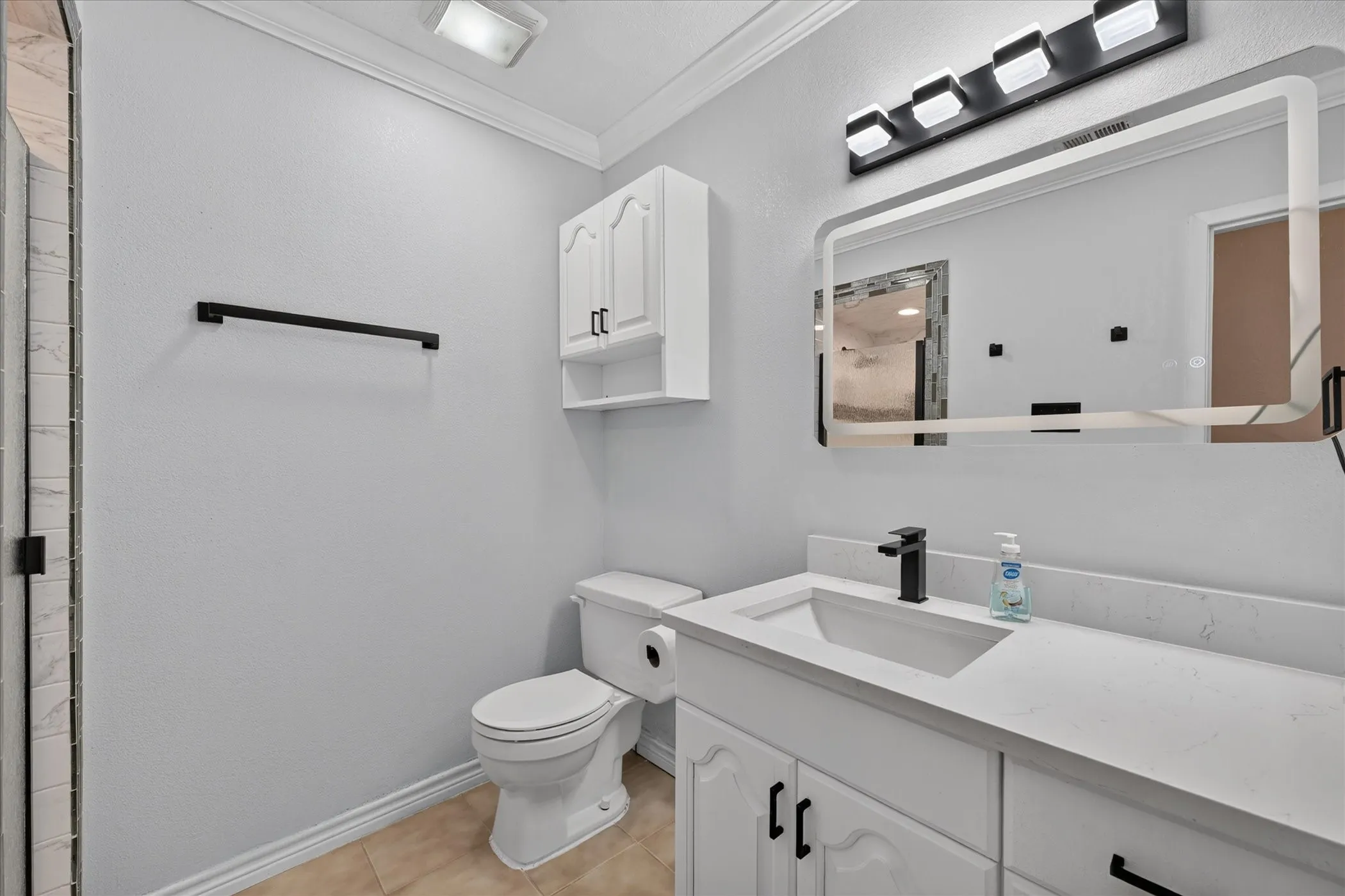 Upstairs bathroom udated vanity, toilet mirror and fixtures
