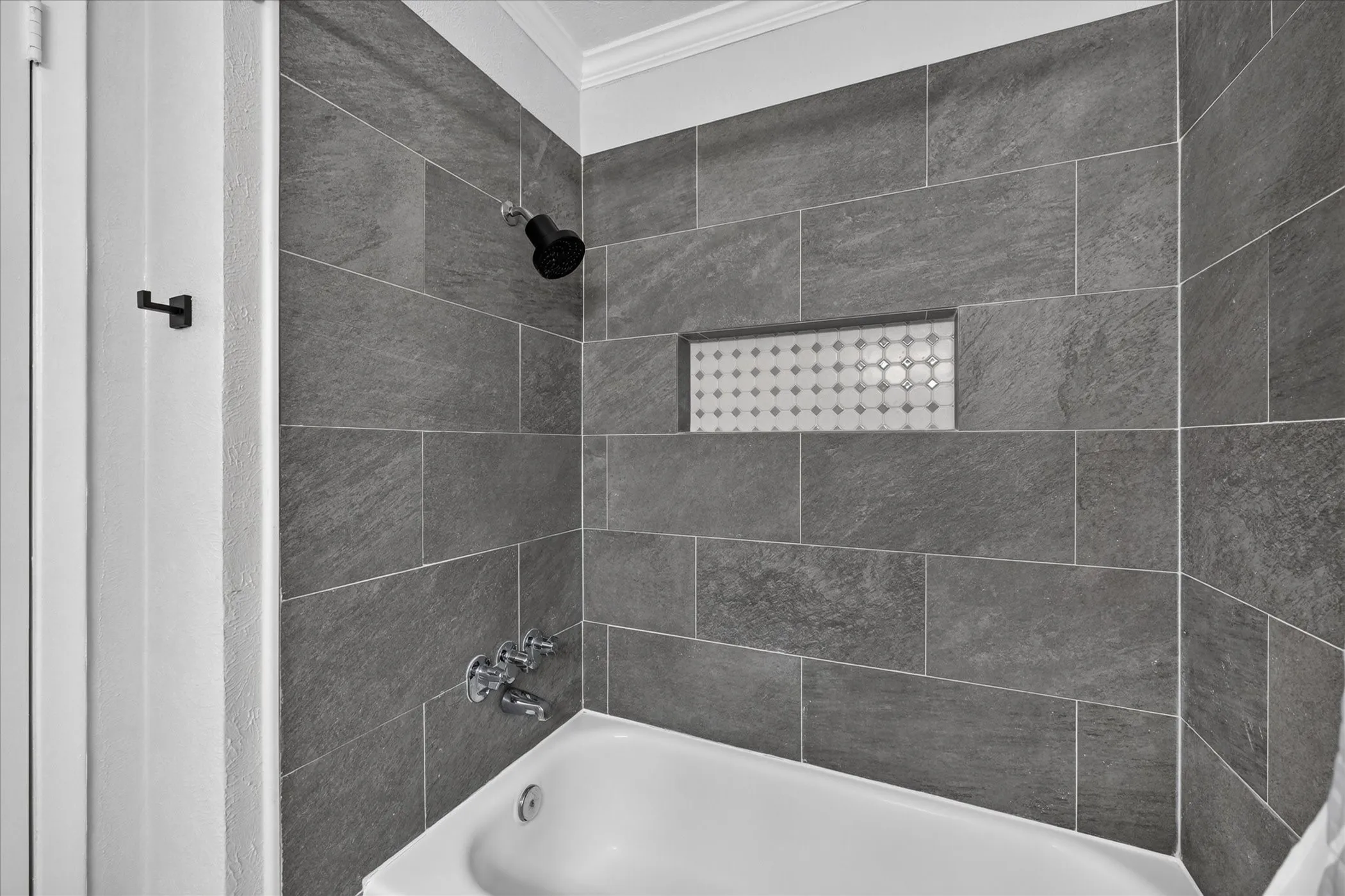 Primary Bath updated tub and tile and fixtures