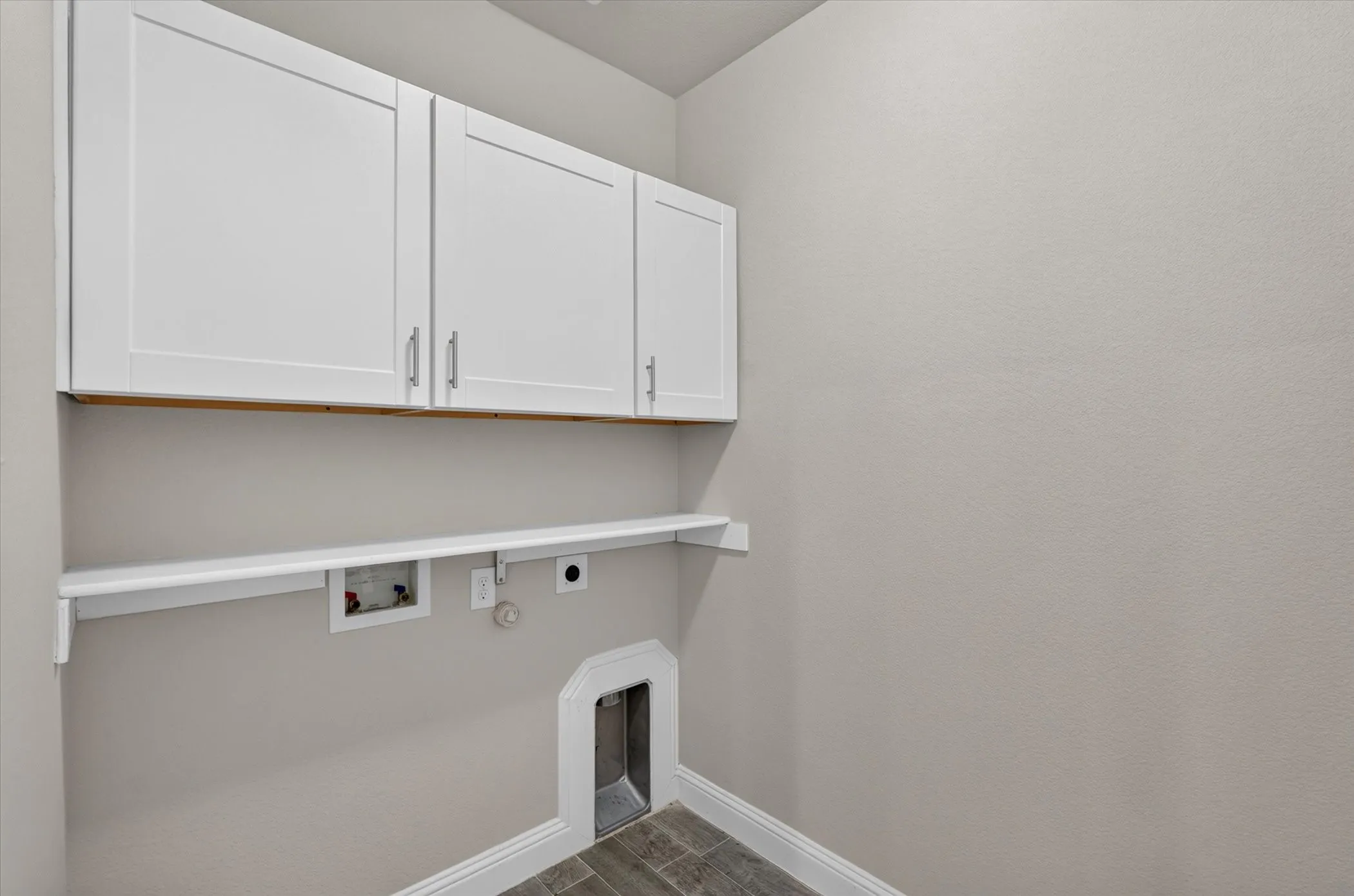 White upper cabinetry with brushed nickel hardware