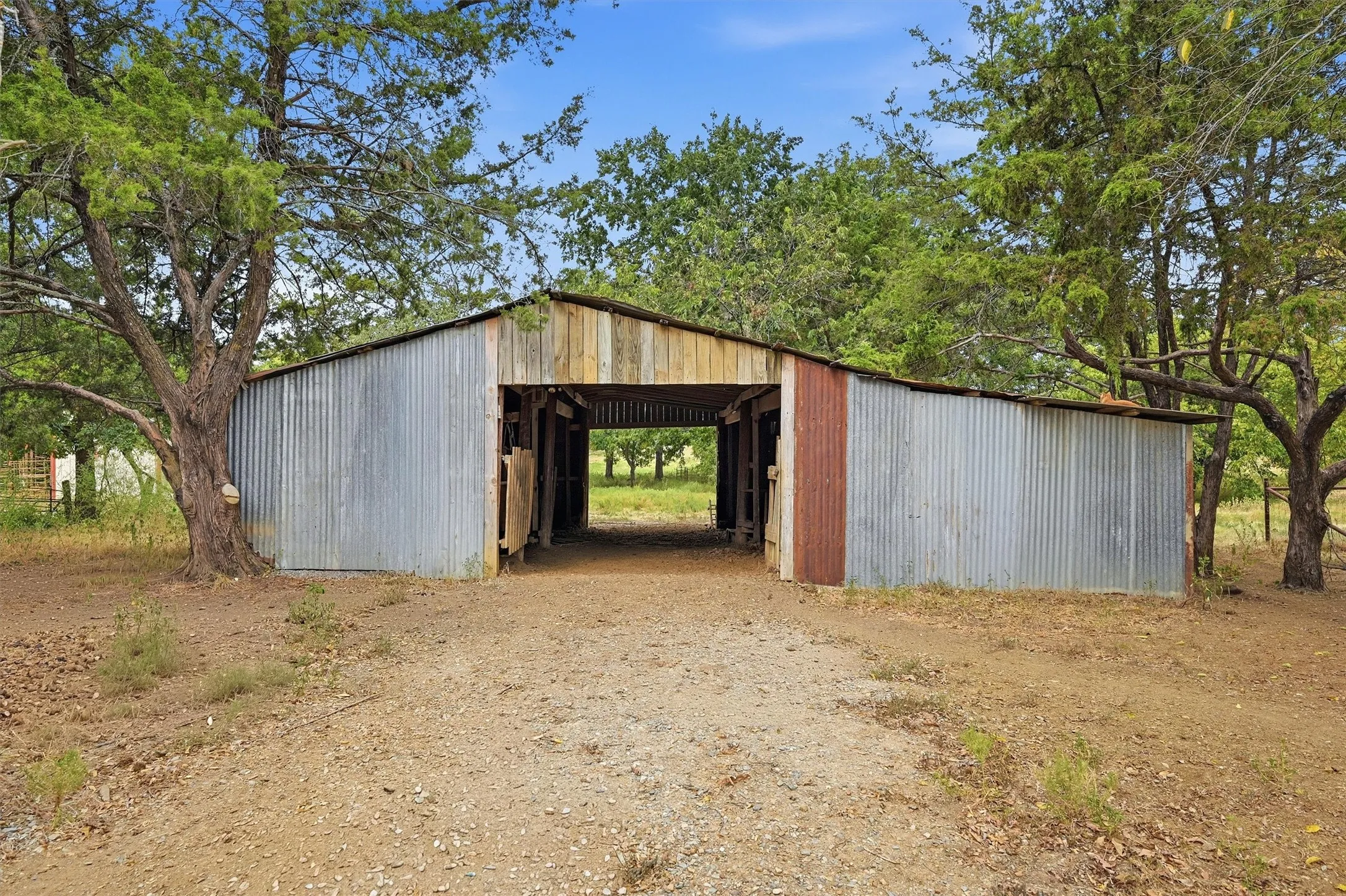 Open-air barn structure.