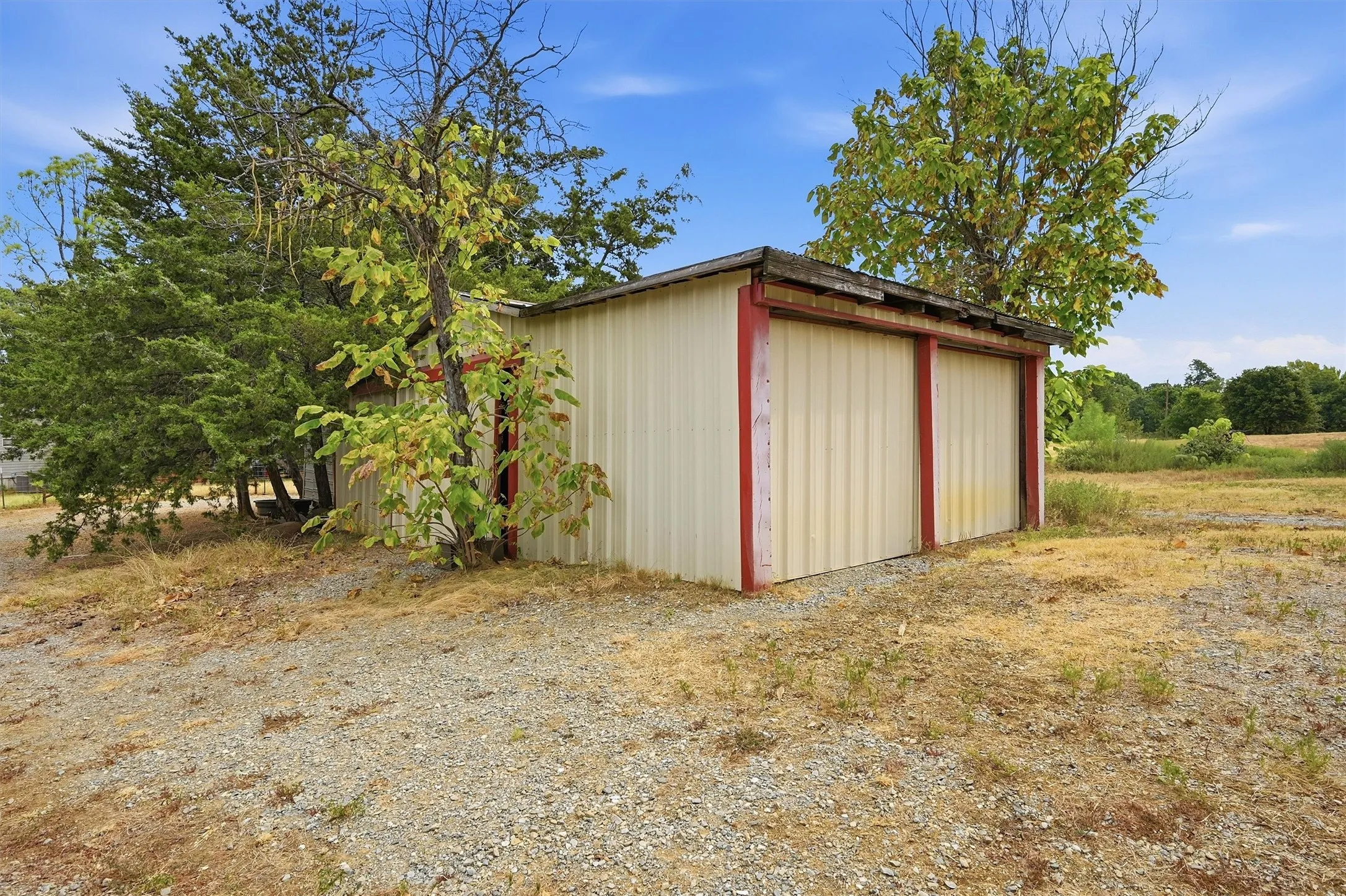 Metal utility building with two bays