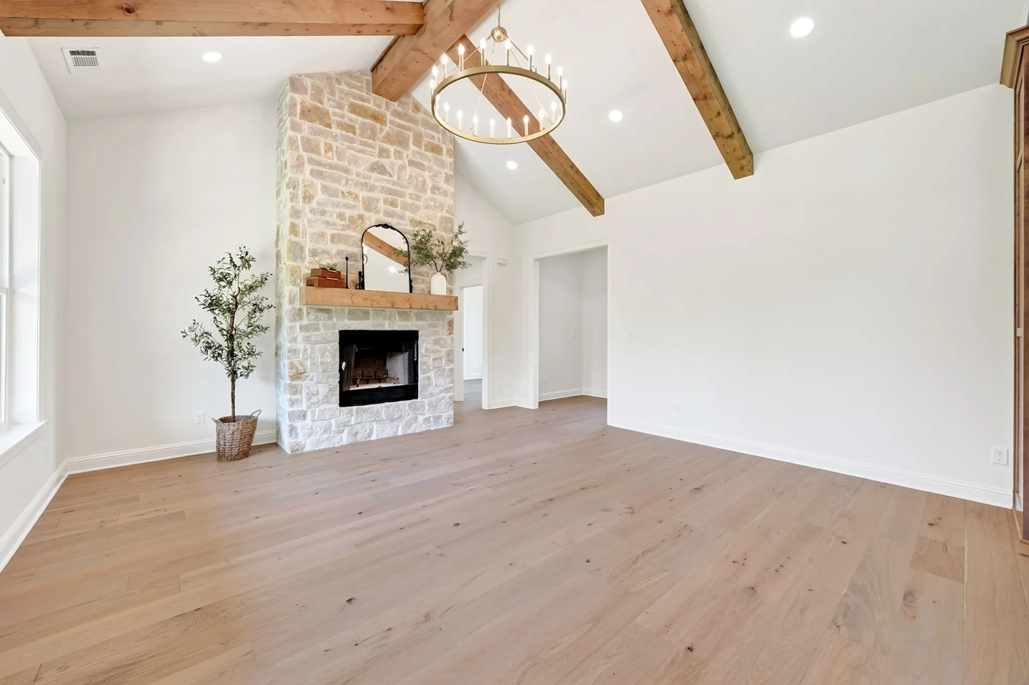 Soaring 16' ceilings in living area. Views from the kitchen/dining area.