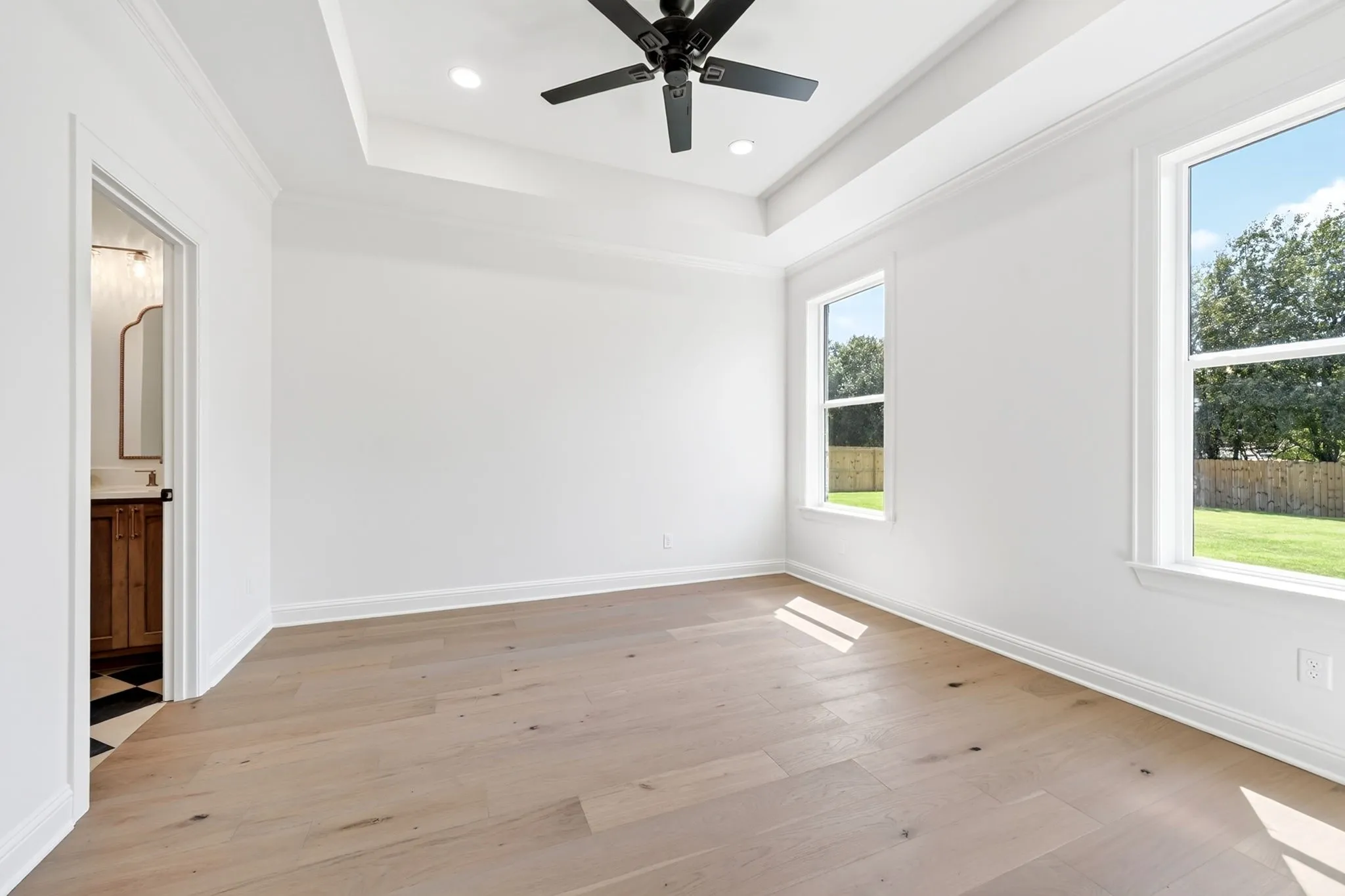 Primary Suite offers a blank canvas for private retreat.