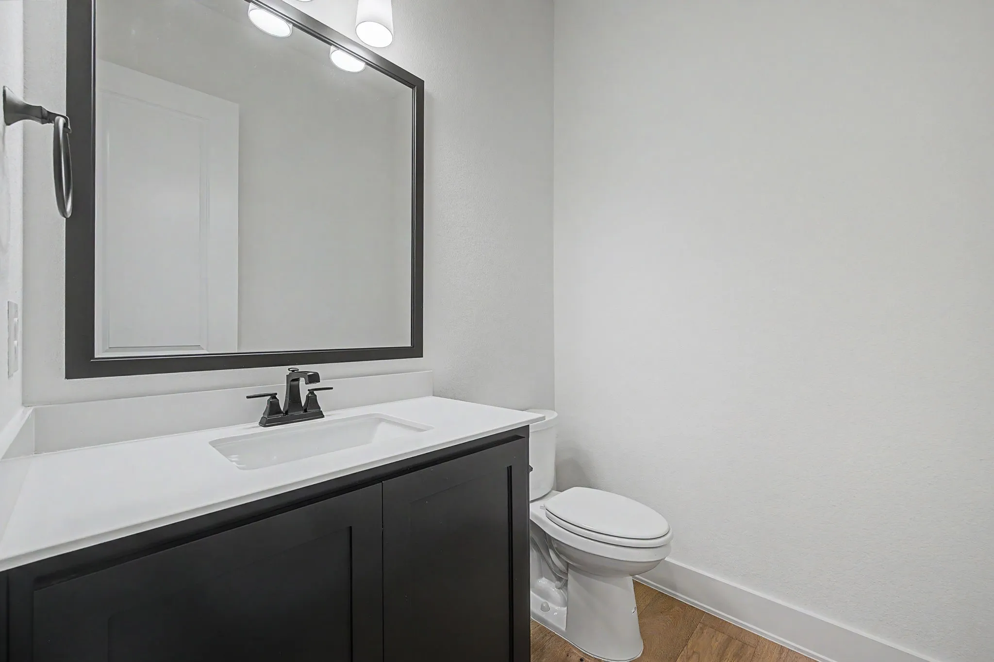 1/2 bath on lower level near family room