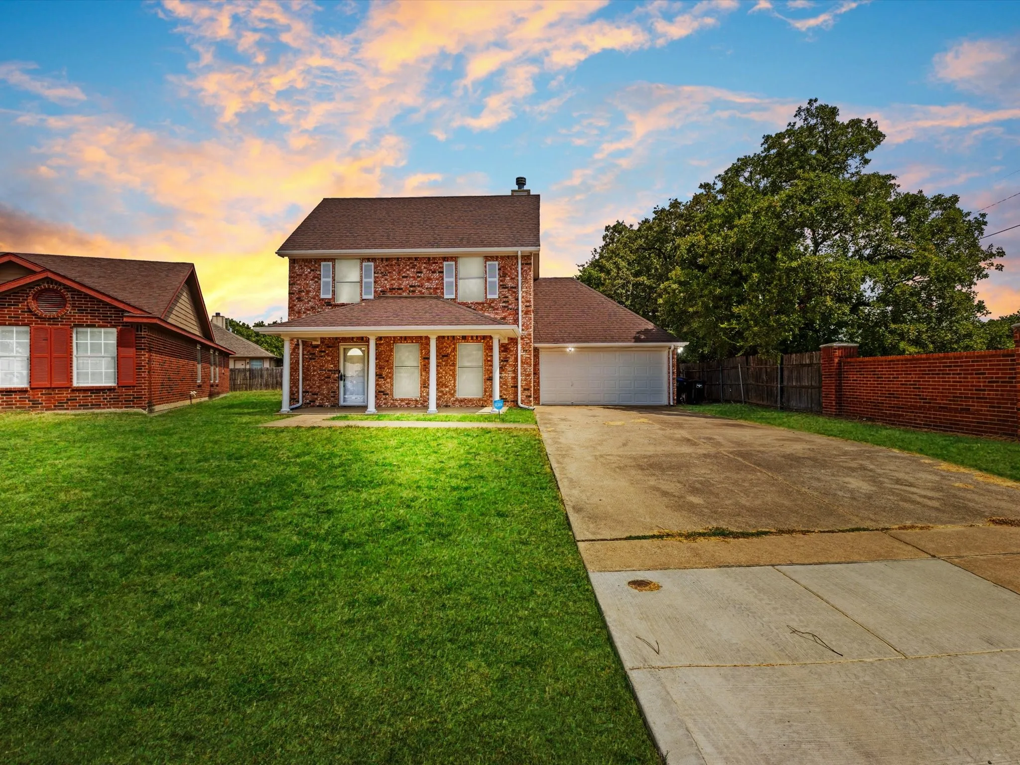 Brick exterior with columned front​​‌​​​​‌​​‌‌​‌‌​​​‌‌​‌​‌​‌​​​‌​​ porch