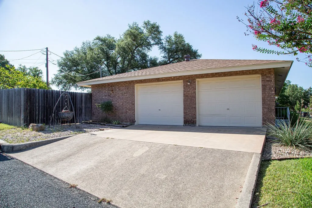 Extra storage or shop area in garage. Side entrance.