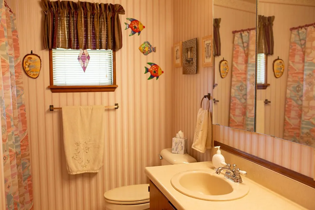 Vanity with an integrated sink and chrome faucet