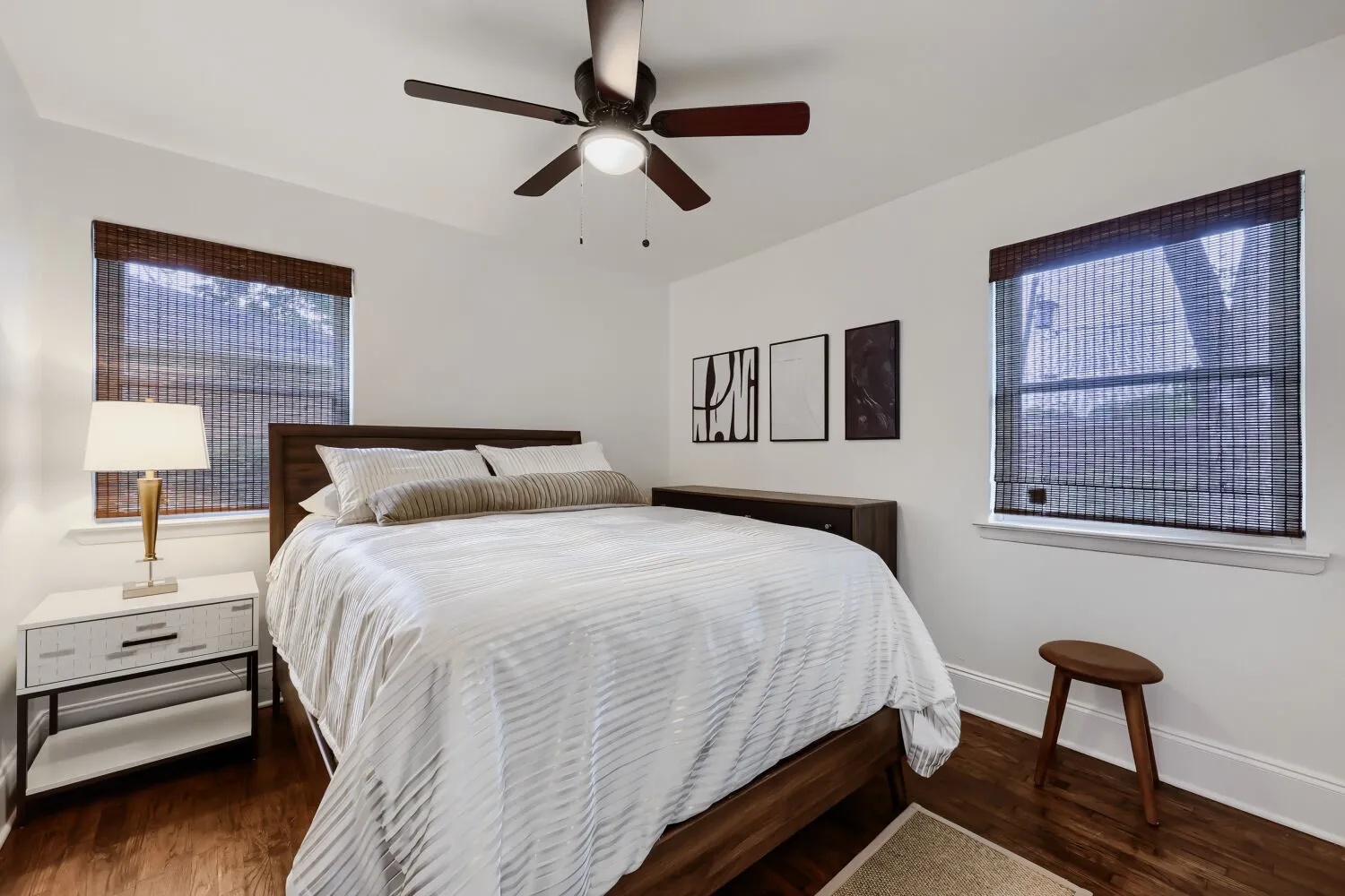 Hardwood flooring, recessed lighting, and a ceiling fan with integrated lighting