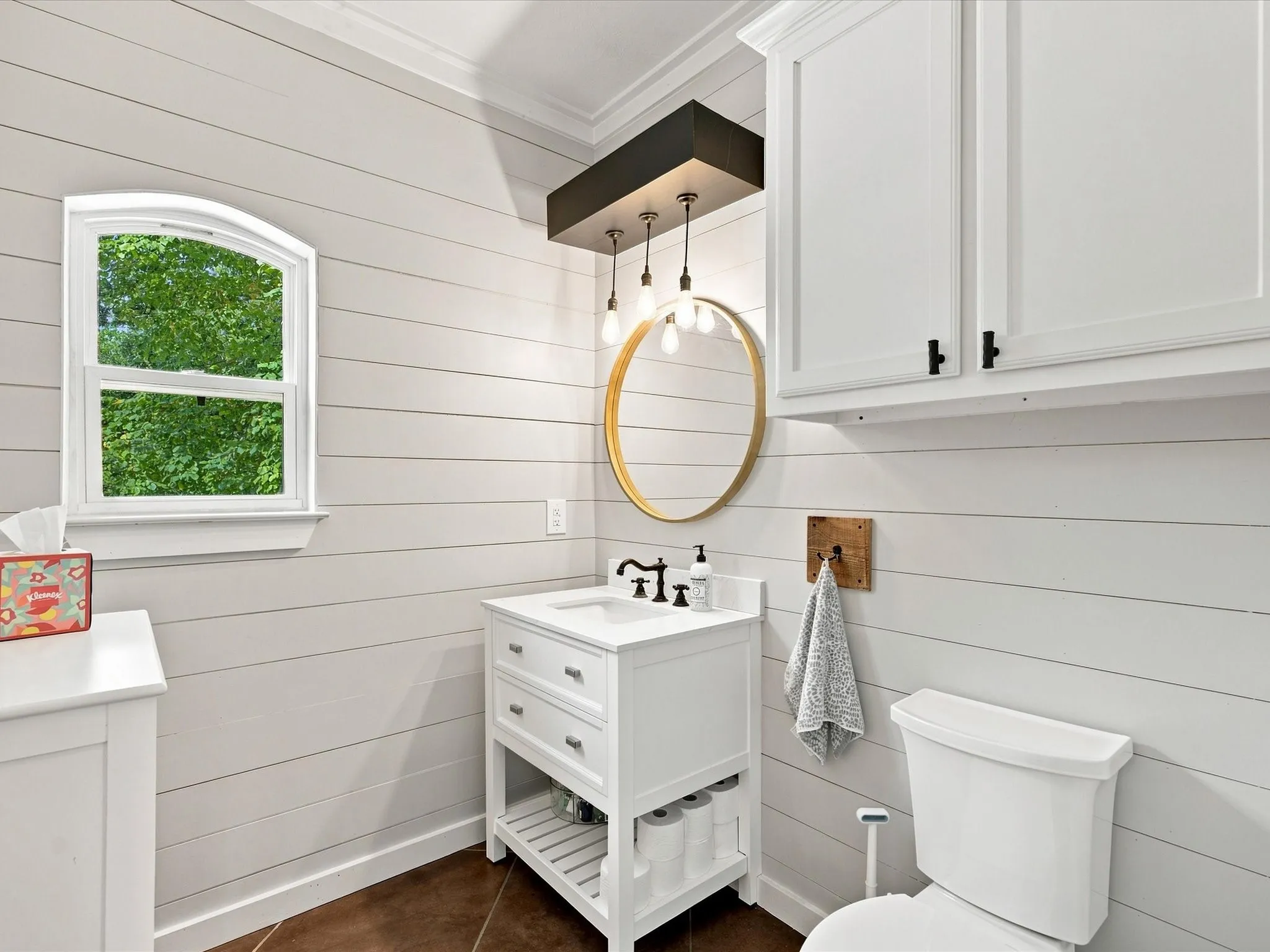 White shiplap walls with crown molding