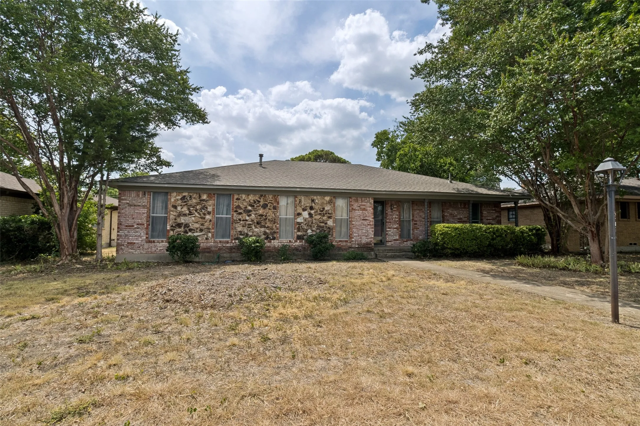 This single story home is on a 70 x 120 lot and ready for a full remodel.
