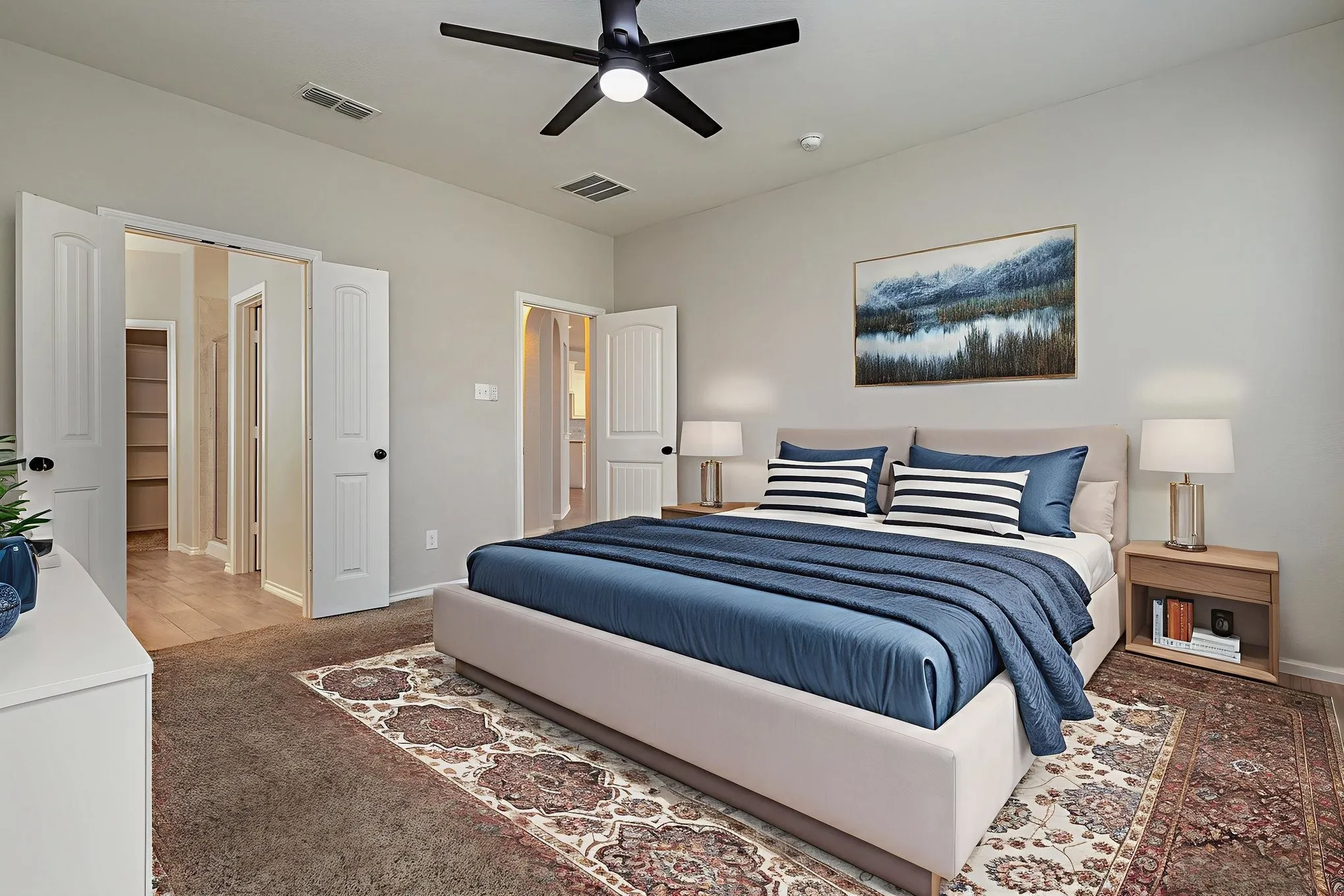 Virtually staged primary bedroom. Split floorplan