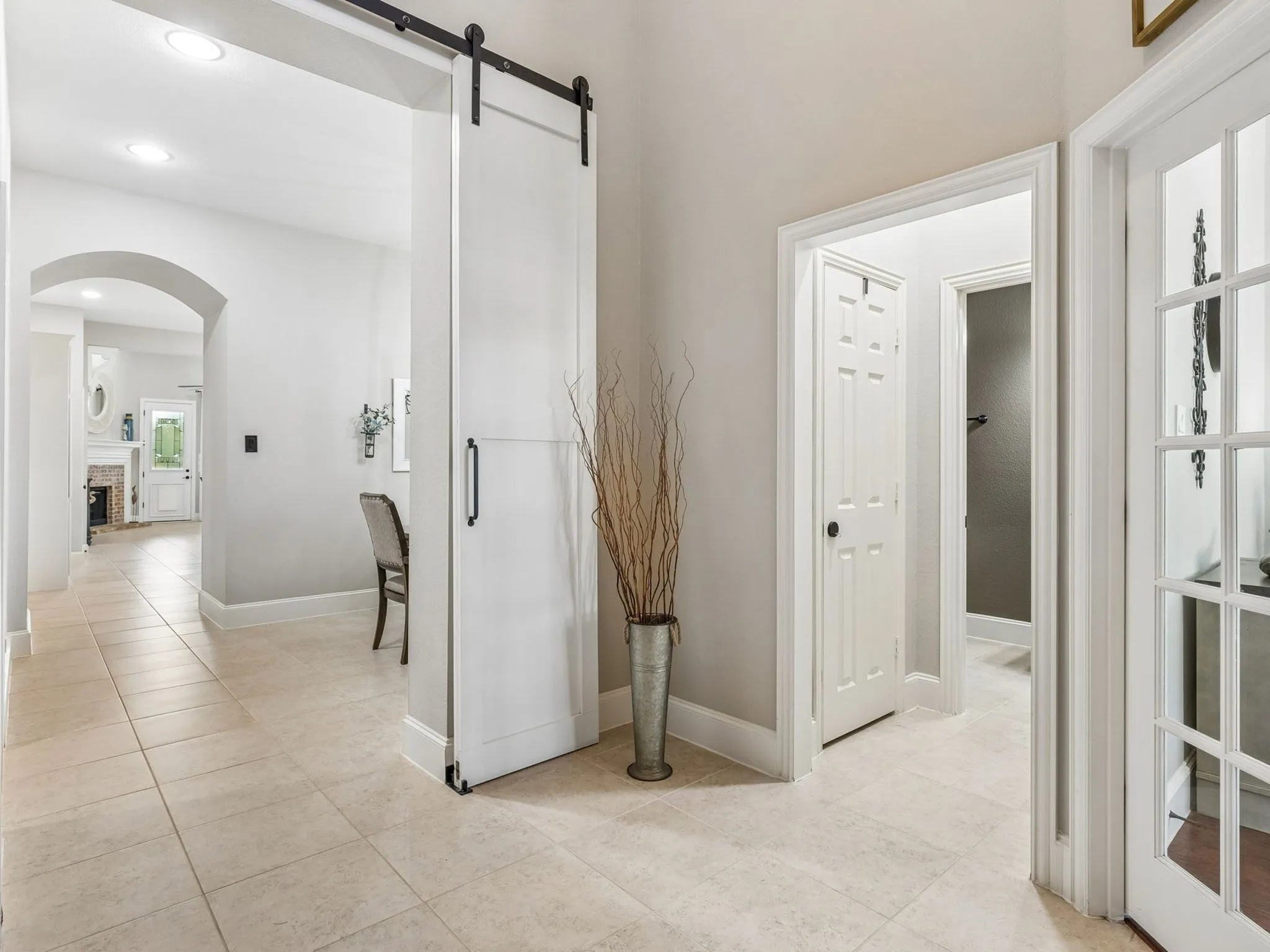 With Barn door to create privacy for office and half bath from the rest of the house.
