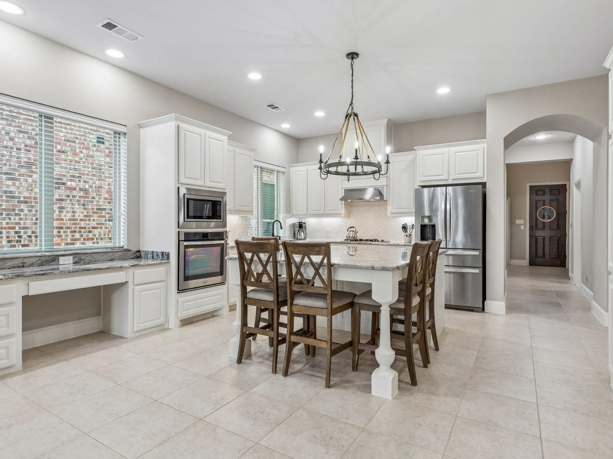 Eat around the large kitchen island.