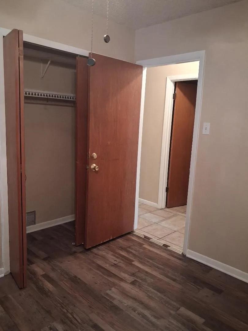 2ND BEDROOM OPENS INTO HALL ACROSS FROM BATH