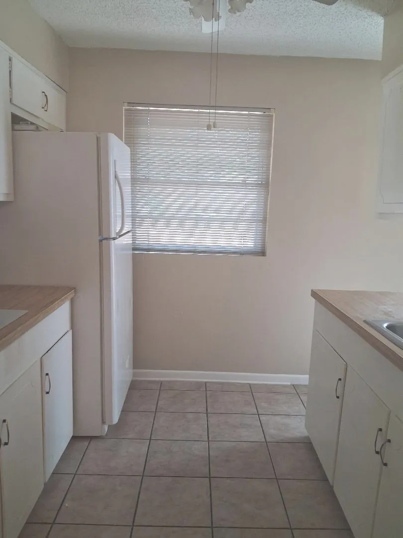 GALLEY KITCHEN OPENS INTO DEN OR 2ND LIVING AREA