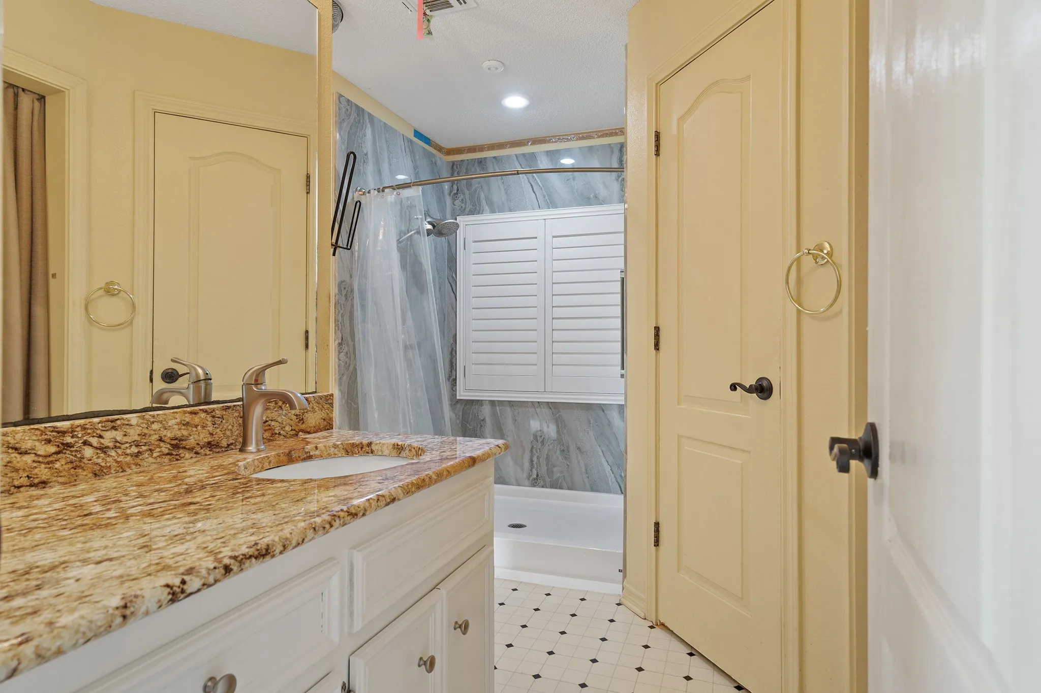 Plenty of storage in the bathroom area.