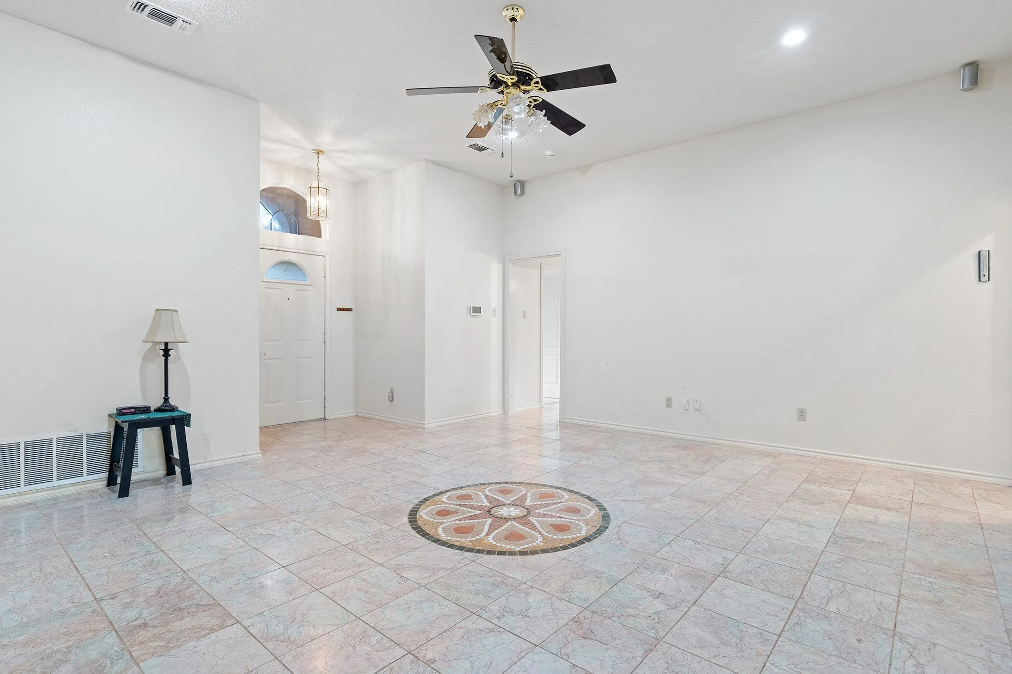 Living room with gorgeous flooring that is also easy to clean!