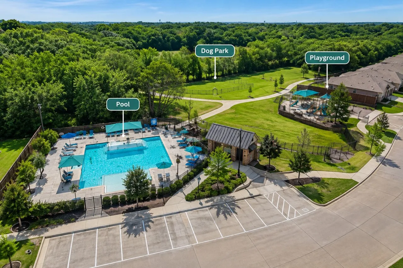 Community amenities featuring a swimming pool, dog park, and playground, surrounded by mature trees