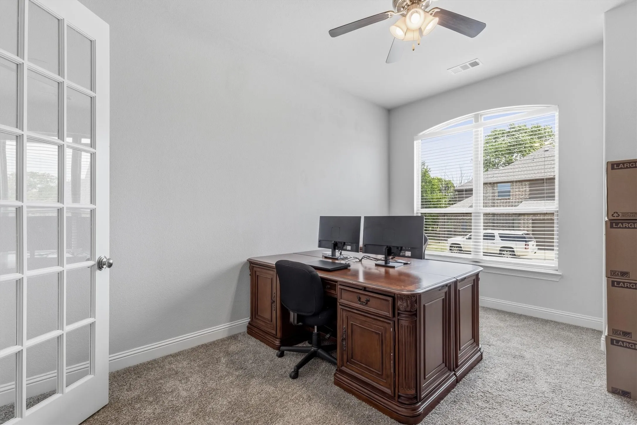 A private home office with 8 ft. French doors.