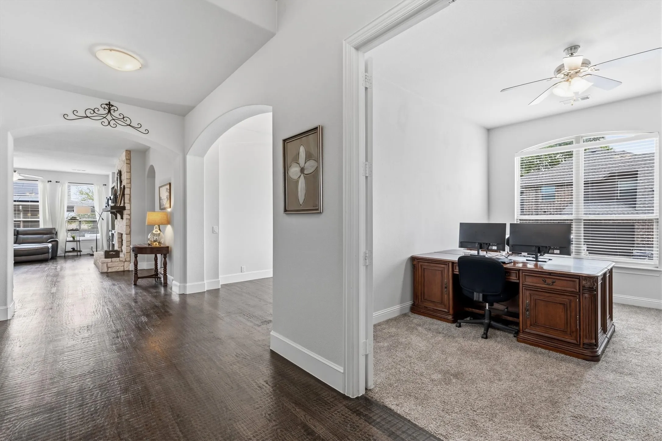 The wide entry hallway offers plenty of wall space for furniture, coat closet on the left as you make your way into the family room.