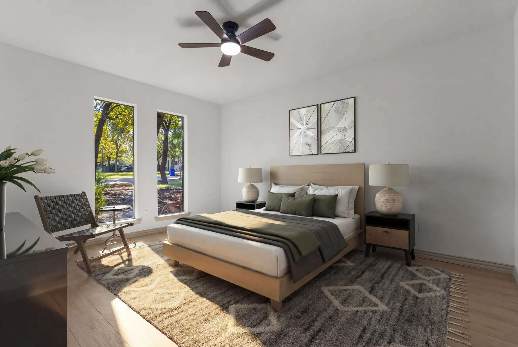 Bedroom featuring light wood-style floors and ceiling fan