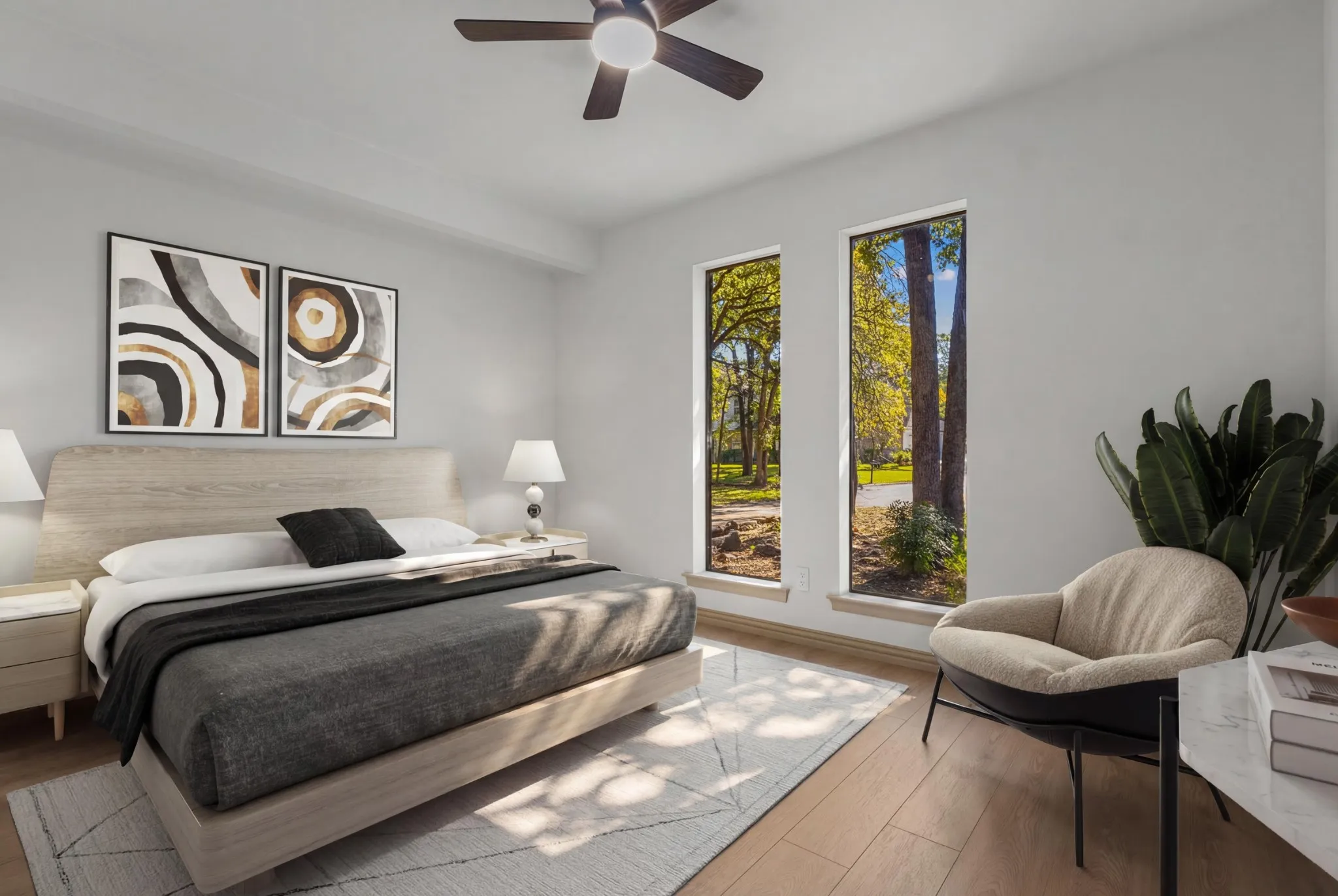 Bedroom featuring wood-type flooring and ceiling fan