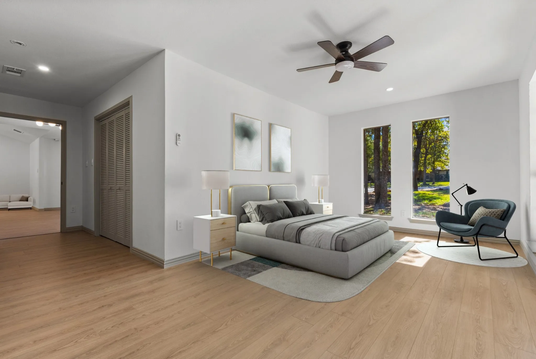Bedroom featuring recessed lighting, light wood-type flooring, a ceiling fan, and a closet
