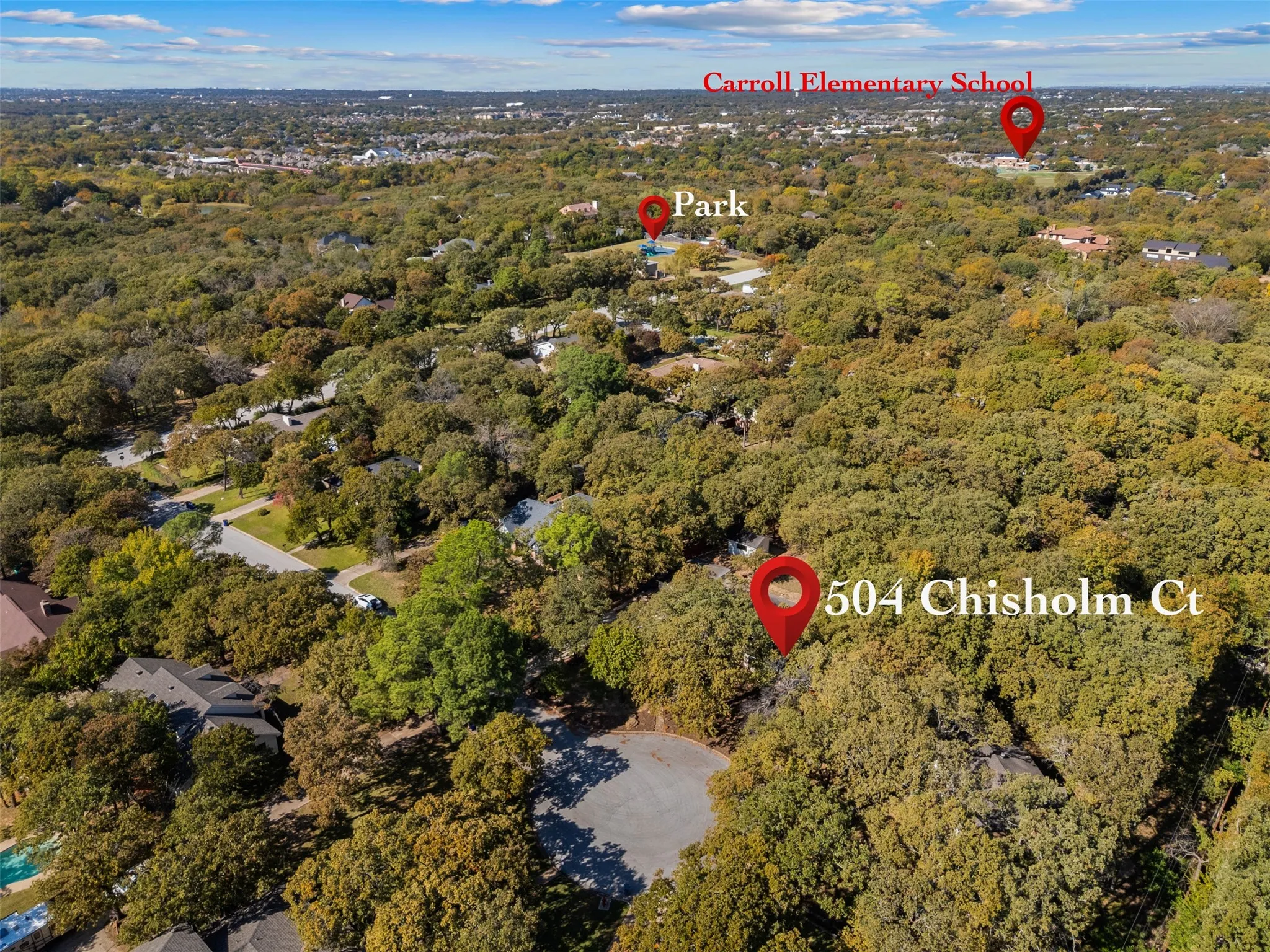Aerial overview of property's location featuring a forest