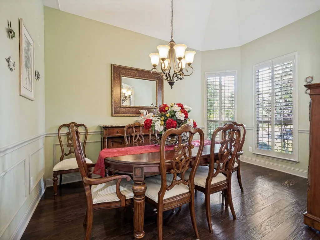 Currently a Generous Formal Dining Room but could easily be used as flex space. Features Picture Frame and Plantation Shutters