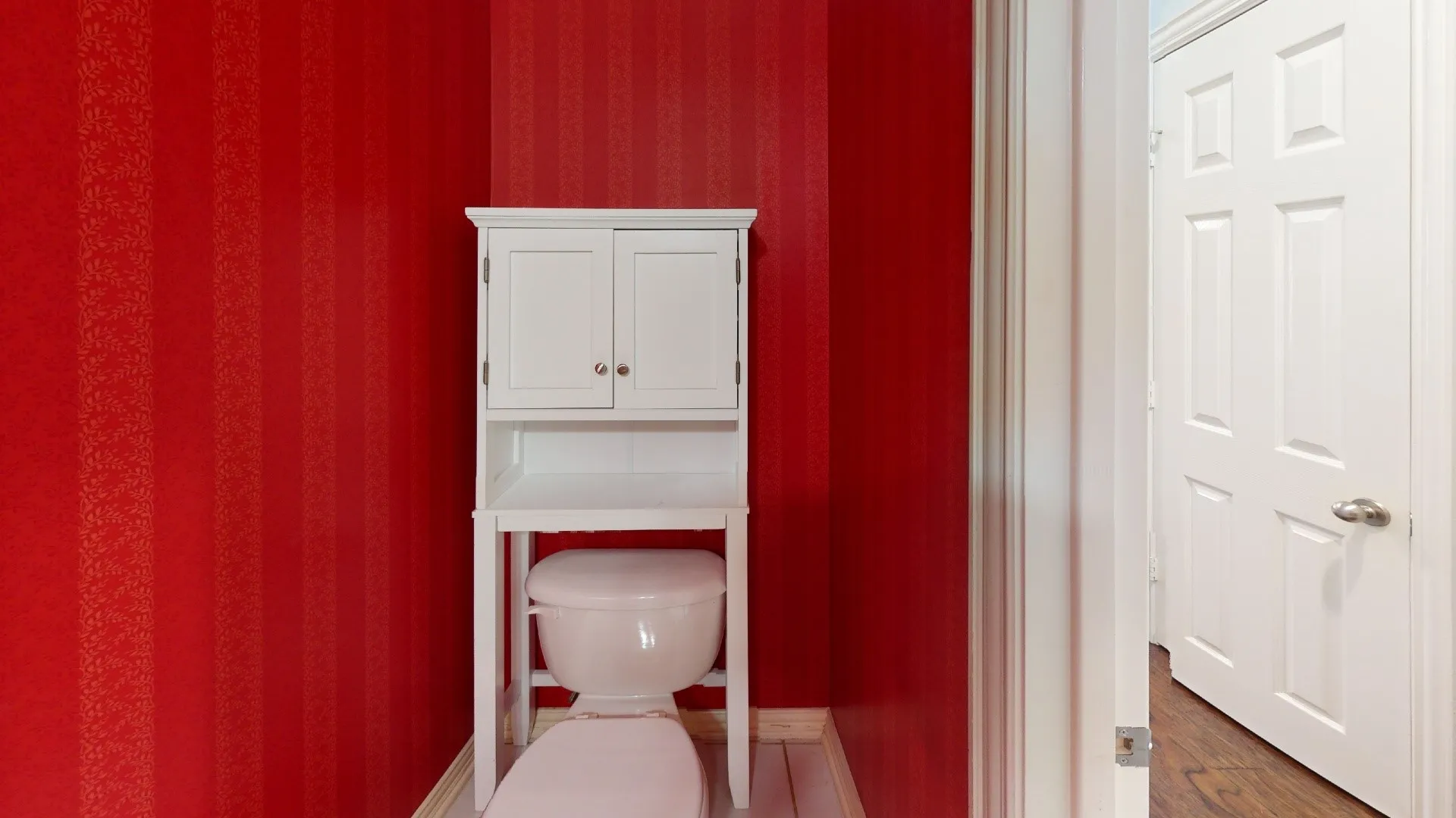 White paneled door with brushed nickel hardware