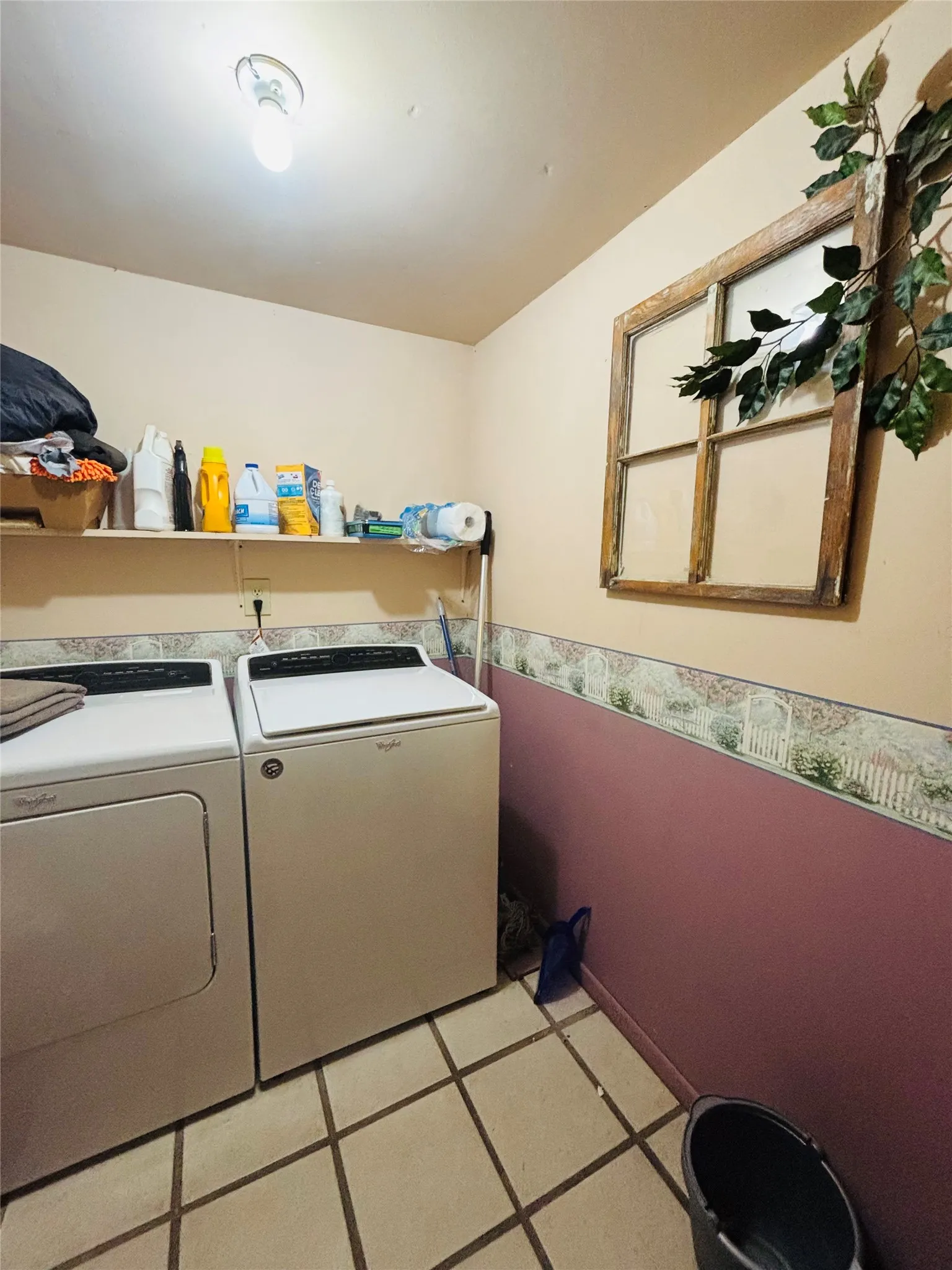 Tile flooring, wall shelving, and ceiling lighting