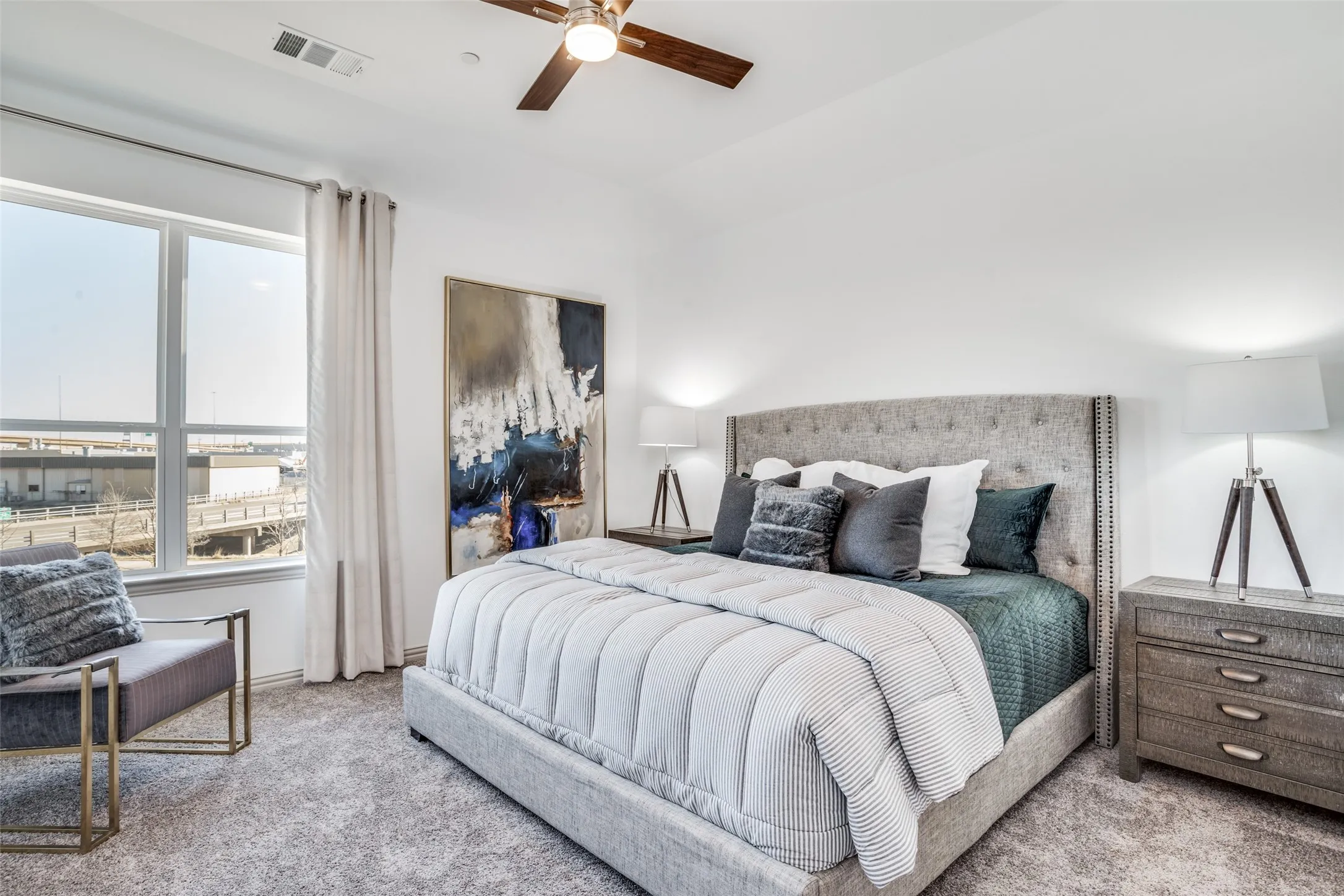 Featuring high ceilings, plush carpeting and oversized windows, this owner's suite offers the ideal place to rest and renew.