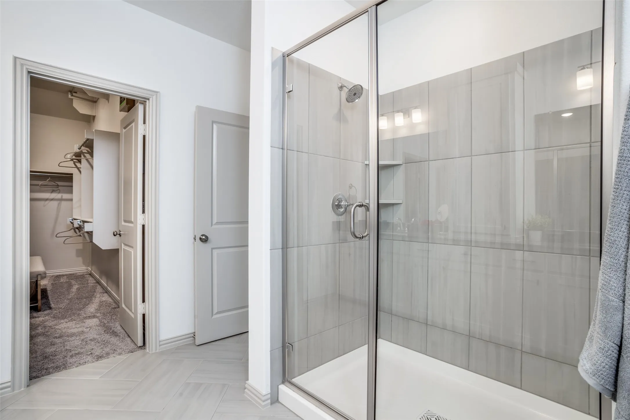 You'll enjoy a spa like experience every day in this gorgeous owner's bath with oversized walk in shower and spacious closet.