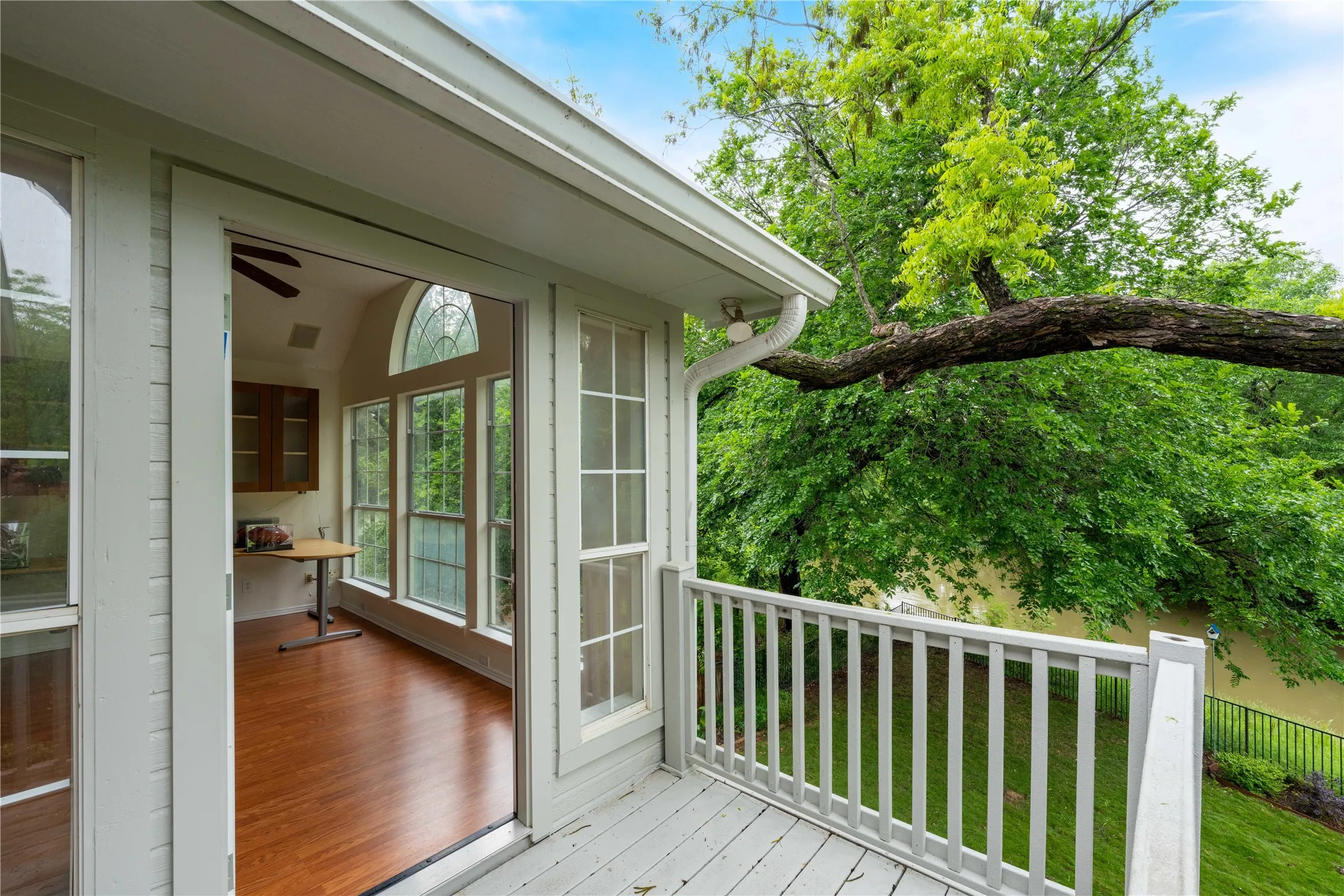 deck in the primary bedroom over looking the creek