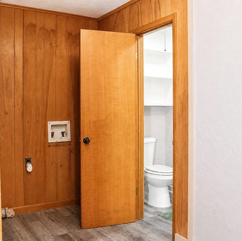 Bathroom next to laundry area and 4th bedroom