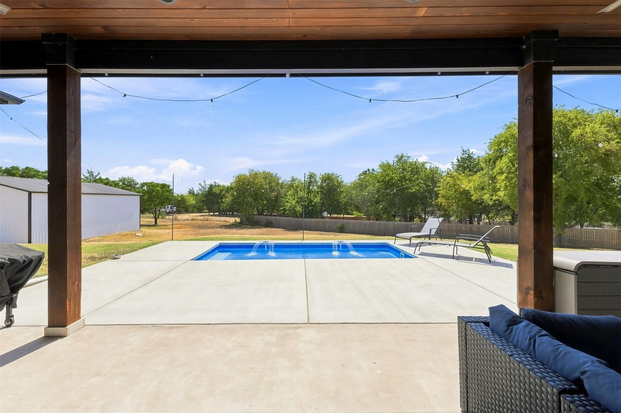 Outdoor covered patio overlooking your 1.1 Acre lot.