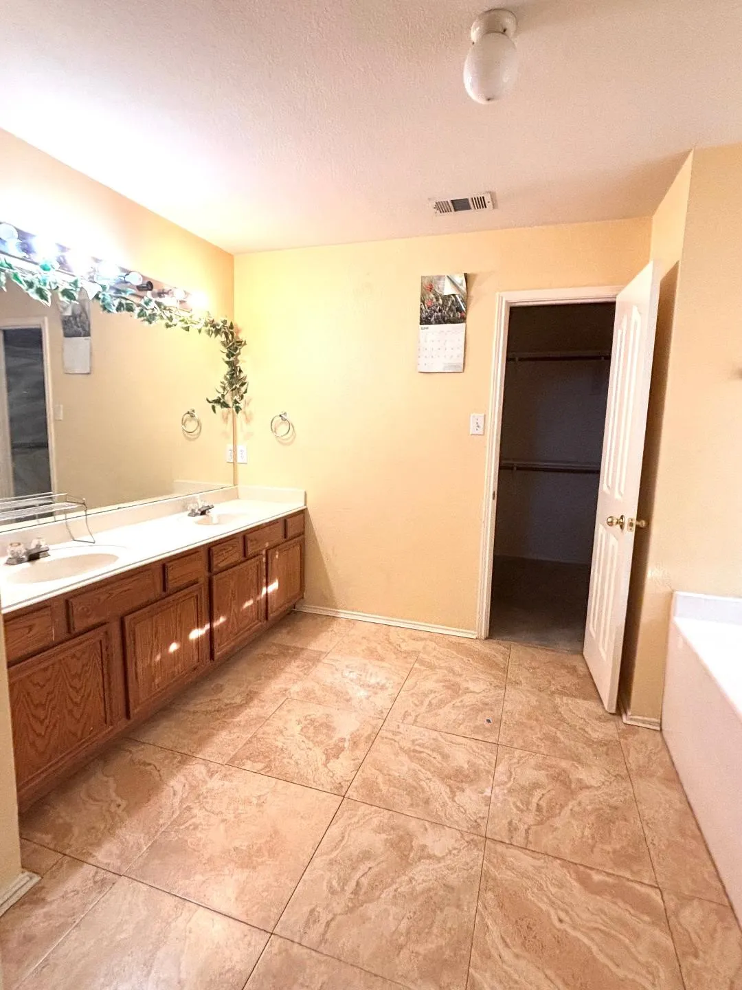 Master bath with dual sinks and lots of counter space.