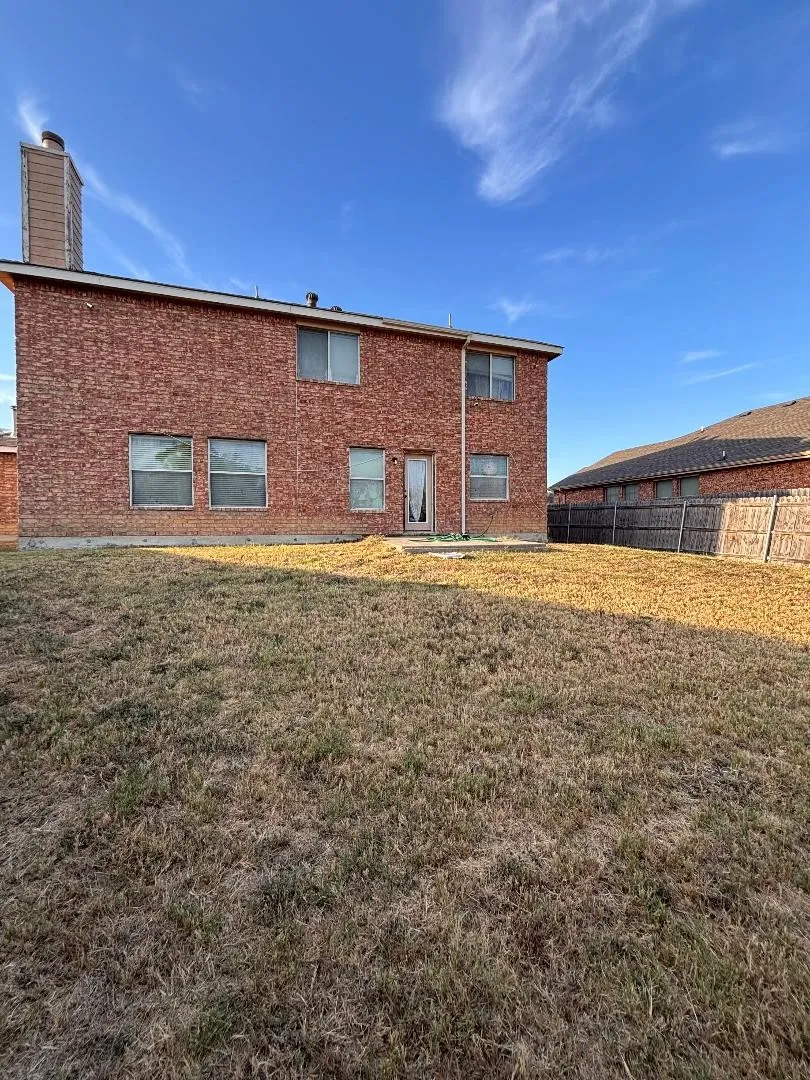 Back of home and yard.
