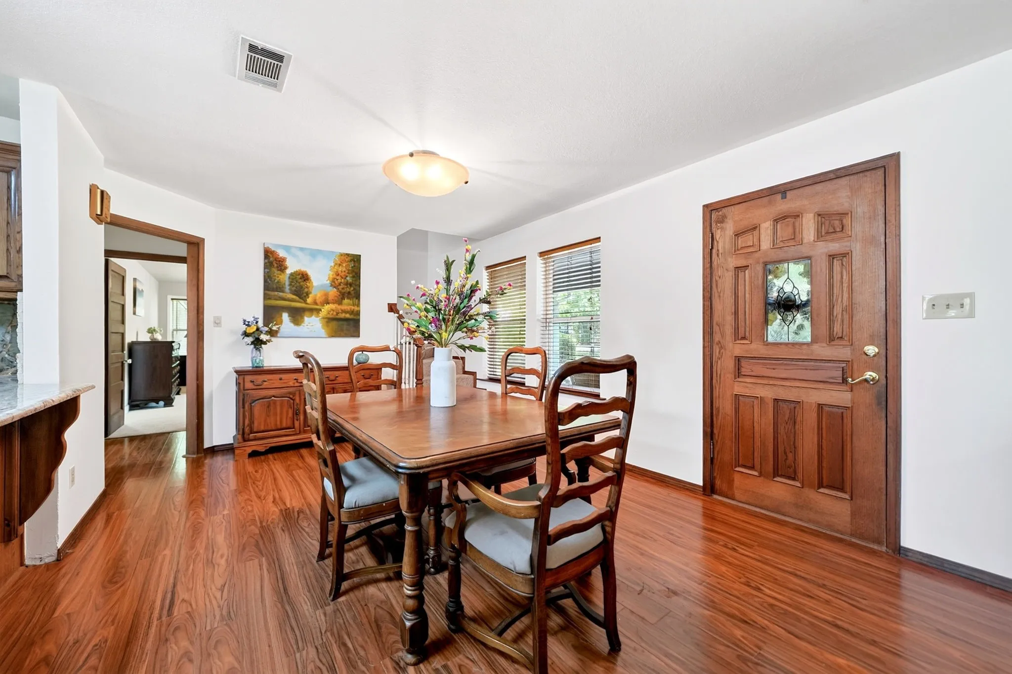 Warm wood-finish flooring throughout