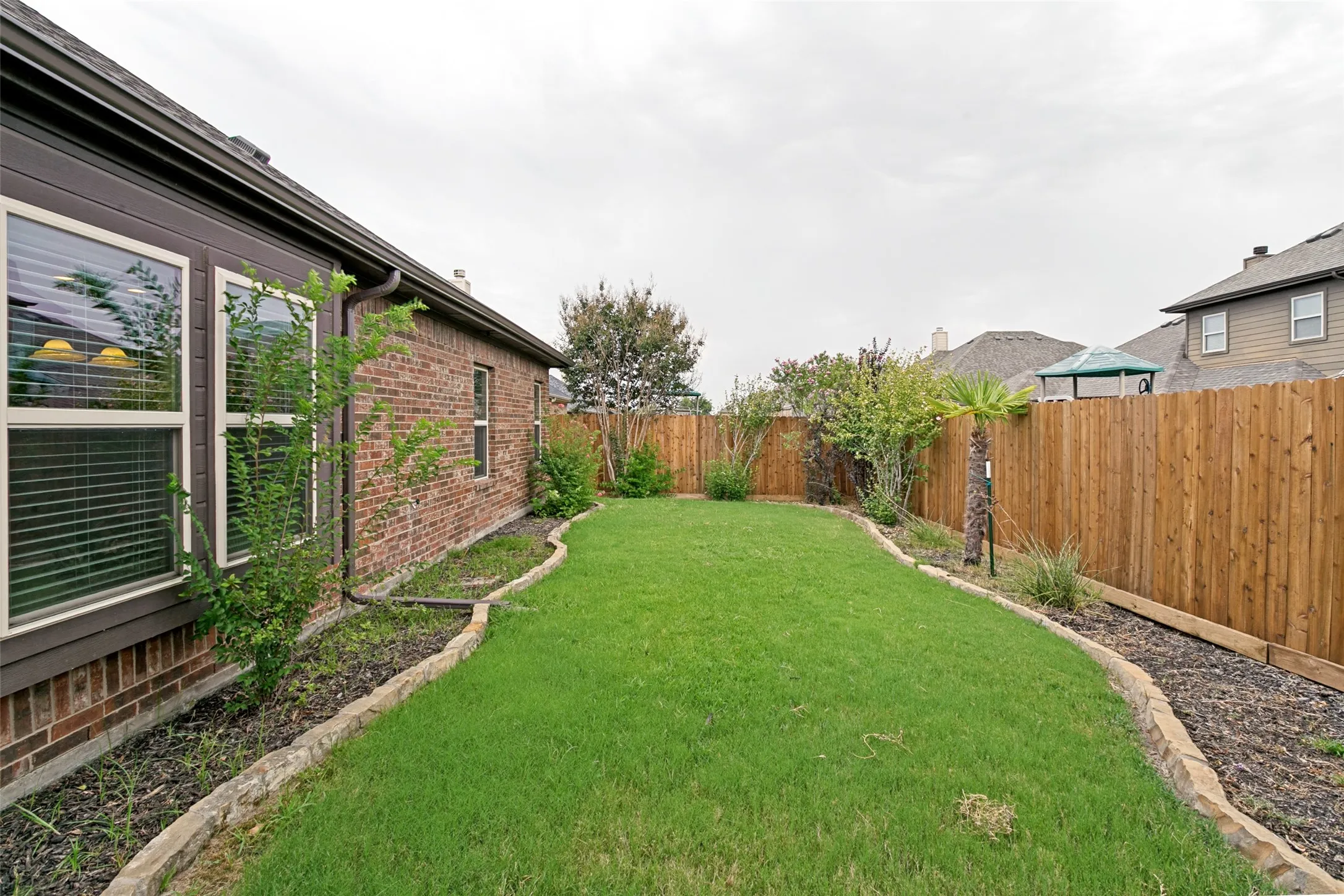 Backyard with landscaping